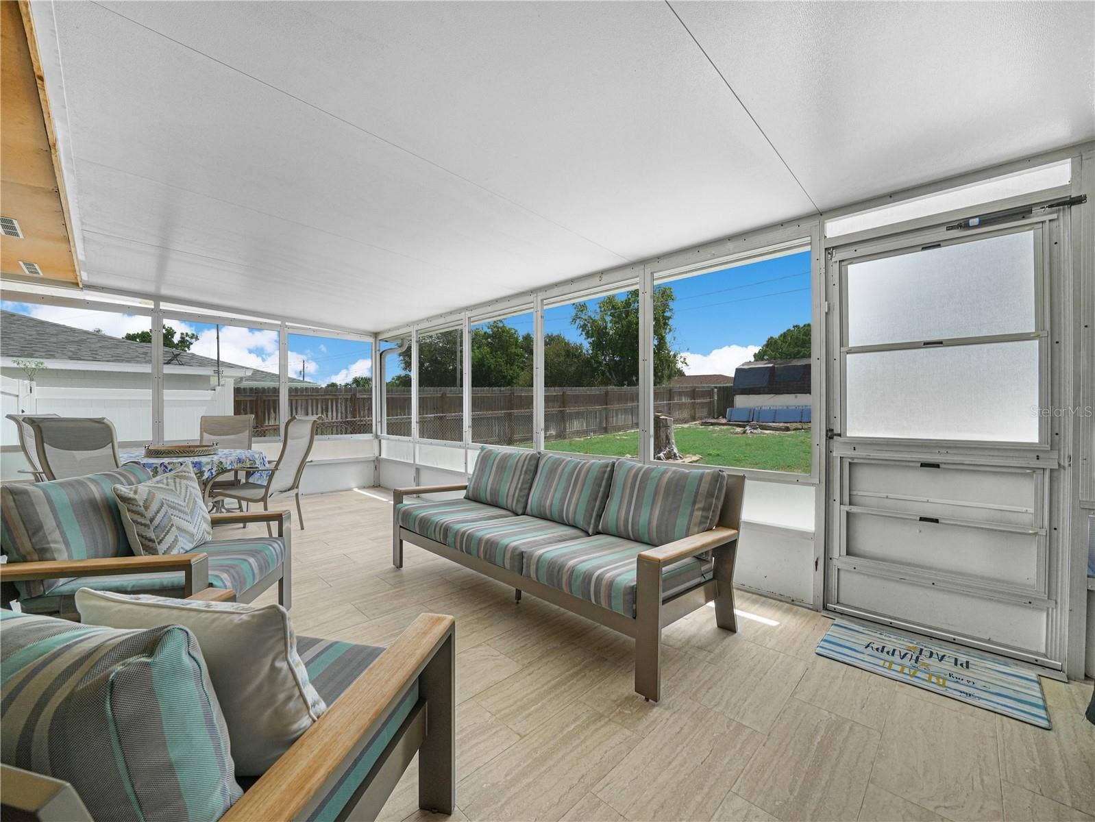 437 BROWARD TERRACE, Winter Haven, FL 33884 Large tiled screened-in patio