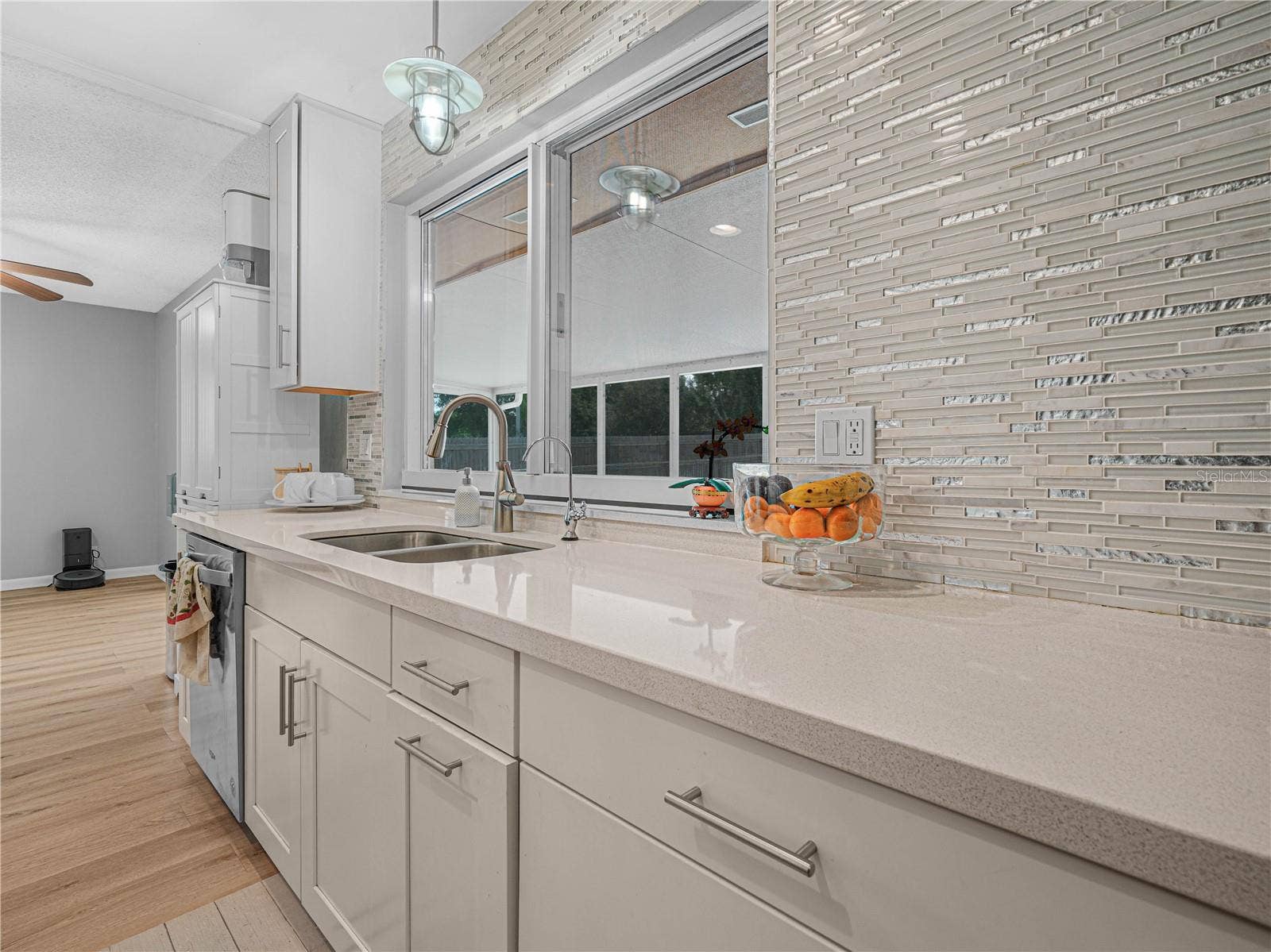 437 BROWARD TERRACE, Winter Haven, FL 33884 updated kitchen with pass-through window for easy access to patio guests