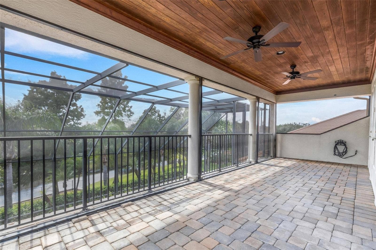 2734 BELLERIVE DRIVE, Lakeland, FL 33803 With wood ceiling above and brick pavers under foot.