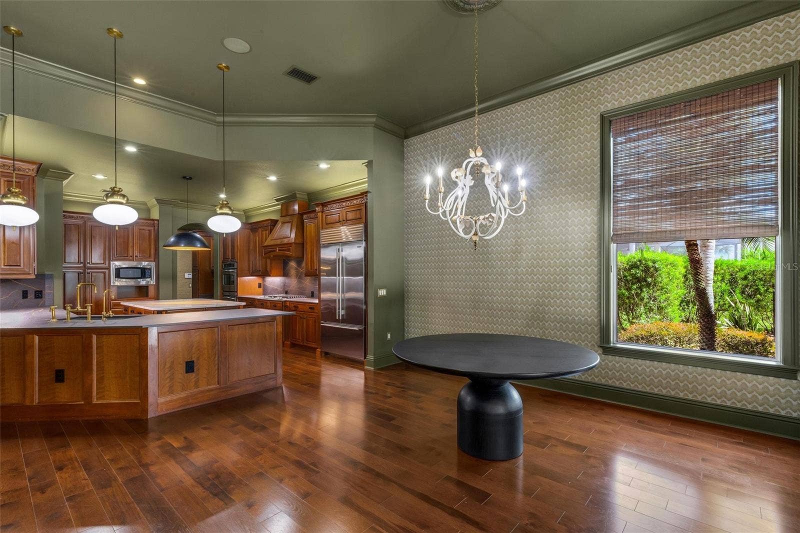 2734 BELLERIVE DRIVE, Lakeland, FL 33803 Designer features include new light fixtures, solid wood Kraft Maid cabinets, high-end countertops, built-in appliances and so much more.