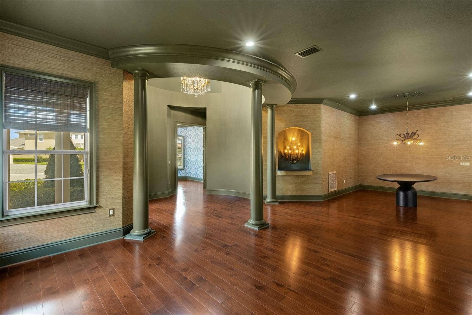 2734 BELLERIVE DRIVE, Lakeland, FL 33803 With gleaming wood flooring throughout, 12' ceilings and dramatic "one of a kind" architectural elements.