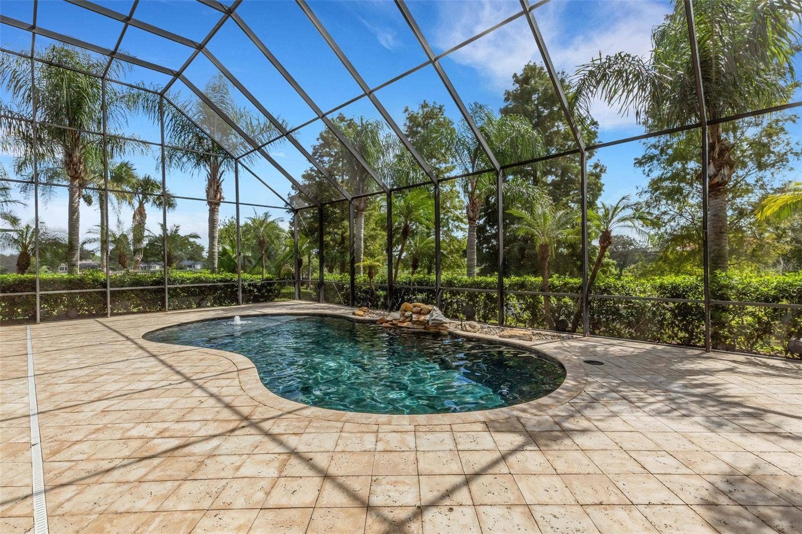 2734 BELLERIVE DRIVE, Lakeland, FL 33803 Completely screen enclosed by a 2-story structure.