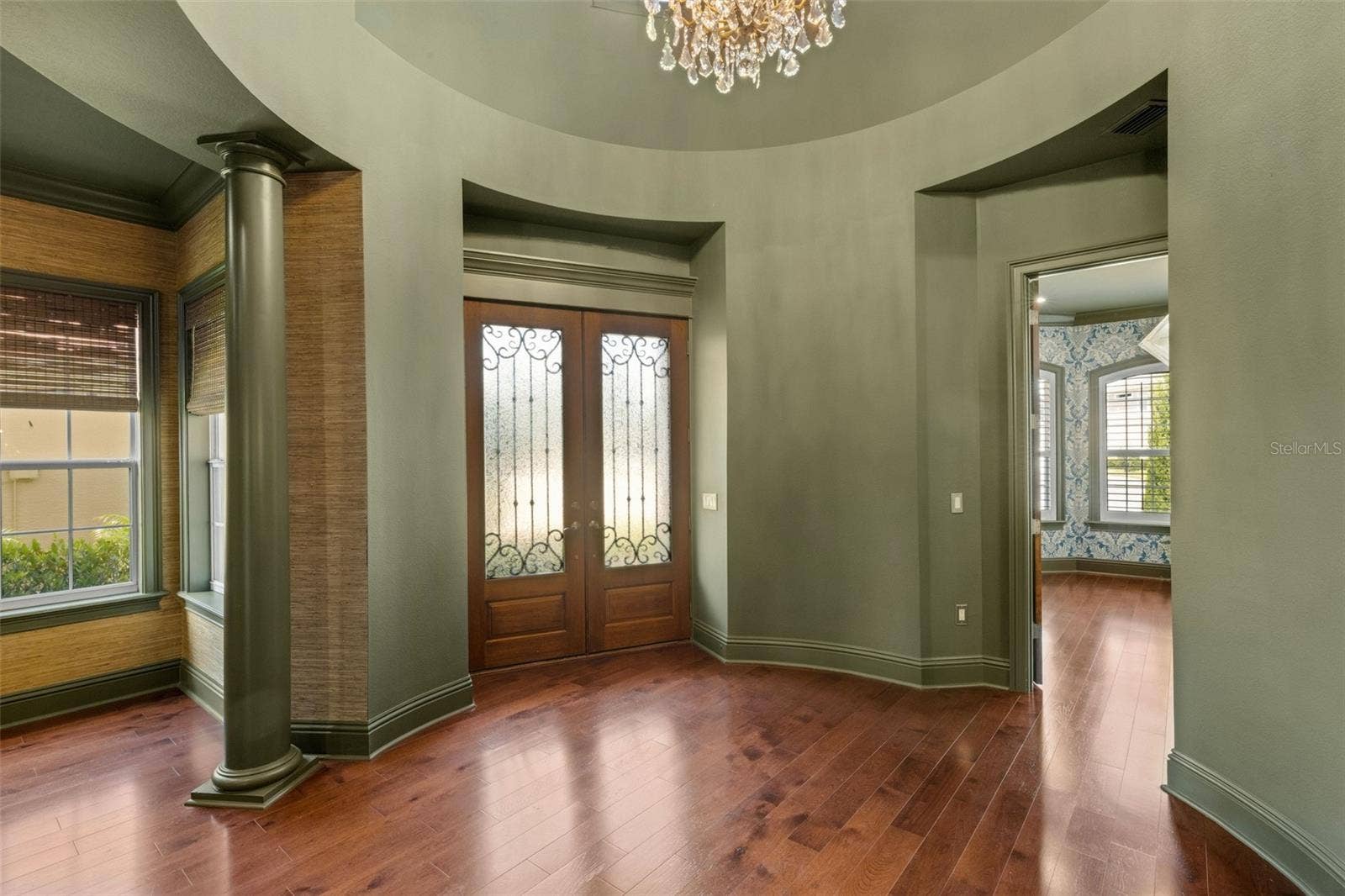 2734 BELLERIVE DRIVE, Lakeland, FL 33803 From the moment you step inside through the custom wood double doors to the signature rotunda foyer . . .