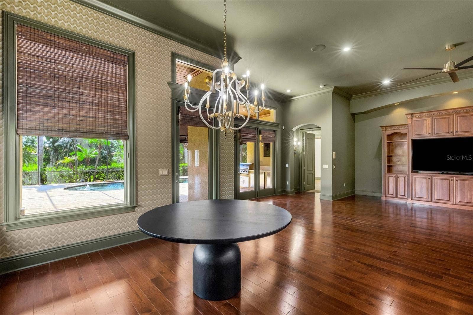 2734 BELLERIVE DRIVE, Lakeland, FL 33803 Large windows flood the space with golden natural light.