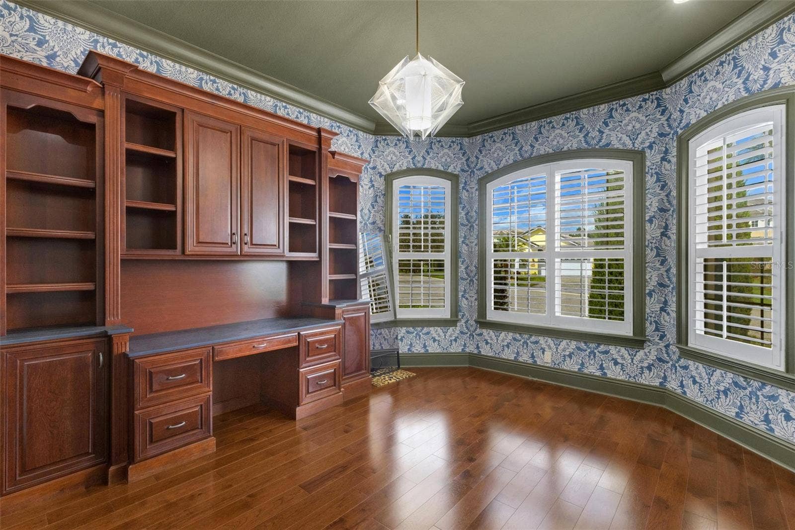 2734 BELLERIVE DRIVE, Lakeland, FL 33803 But there is still space for a desk, worktable, and a full wall of windows overlooking the front of the property.
