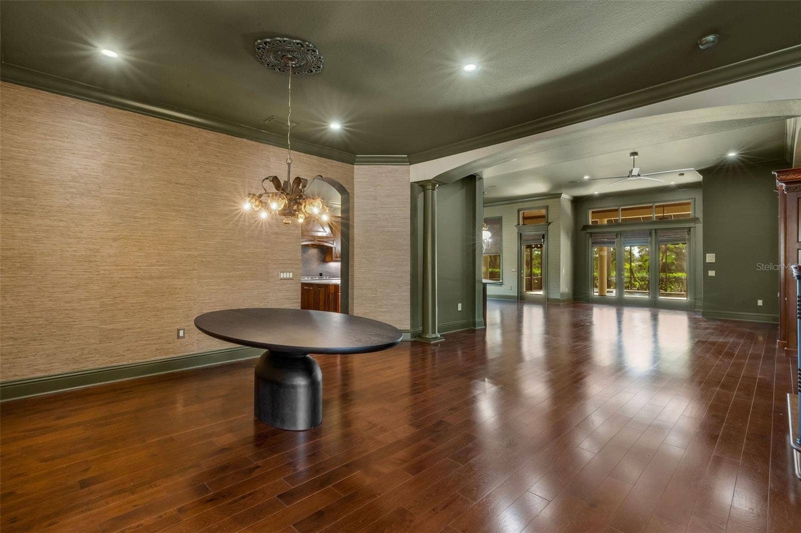 2734 BELLERIVE DRIVE, Lakeland, FL 33803 Custom grass cloth covers the wall in many of the formal spaces.