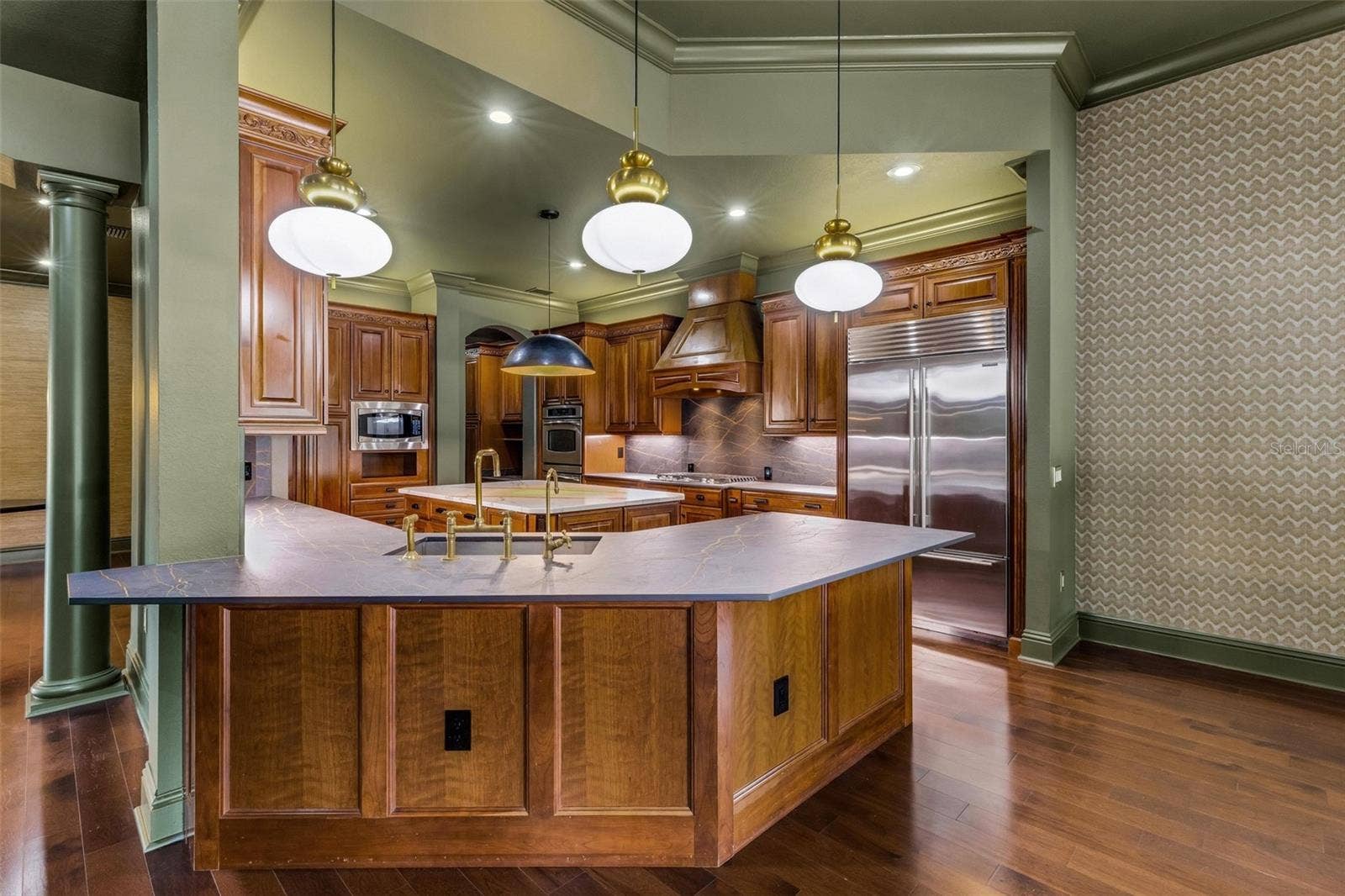 2734 BELLERIVE DRIVE, Lakeland, FL 33803 The custom Dekton countertops are made by Cosentino that blends minerals used in glass, porcelain and quartz forming an ultra durable material that is resistant to heat water, stains, UV light, and scratches and will withstand whatever you throw its way!!