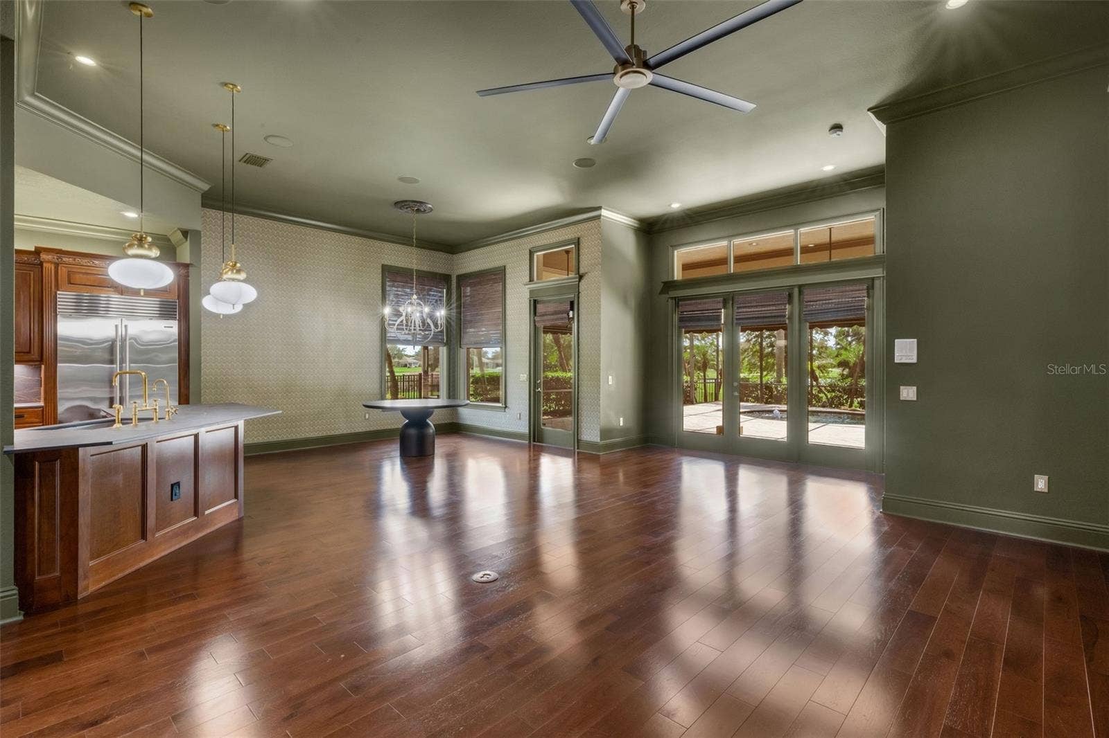 2734 BELLERIVE DRIVE, Lakeland, FL 33803 and is directly adjacent to the casual dining area and chef's kitchen.