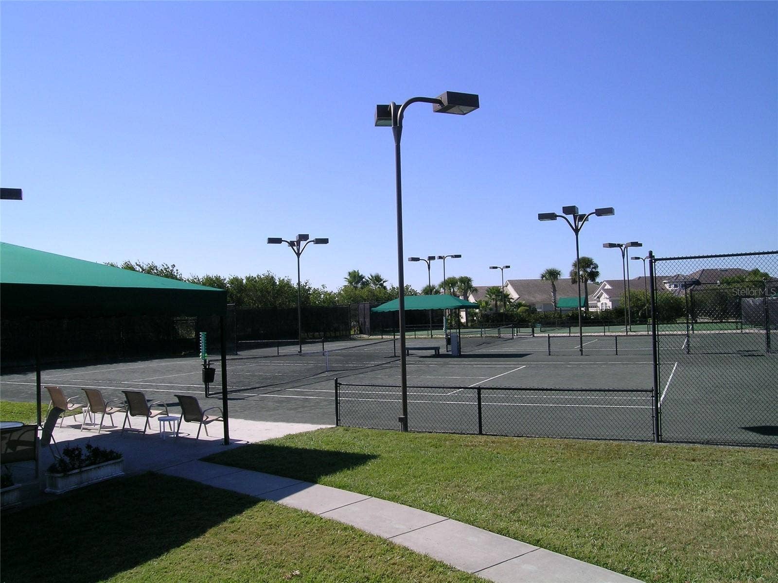 2734 BELLERIVE DRIVE, Lakeland, FL 33803 with 5 soft courts for tennis and 4 pickleball courts.
