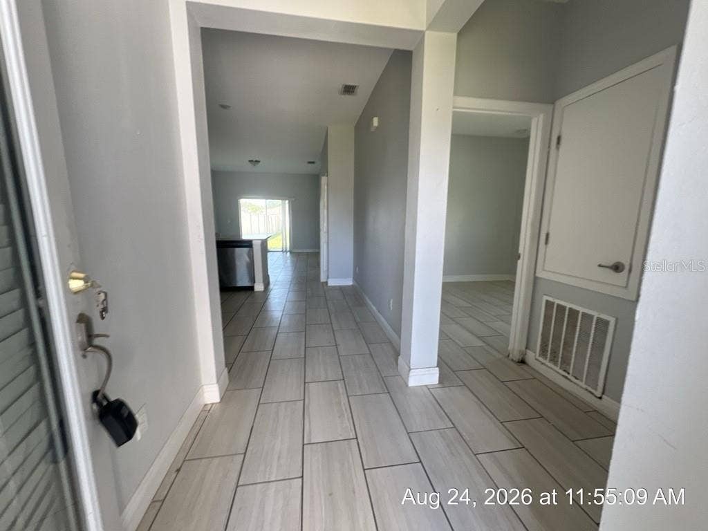 625 BITTERN COURT, #A & B, Poinciana, FL 34759 View from front door Unit A