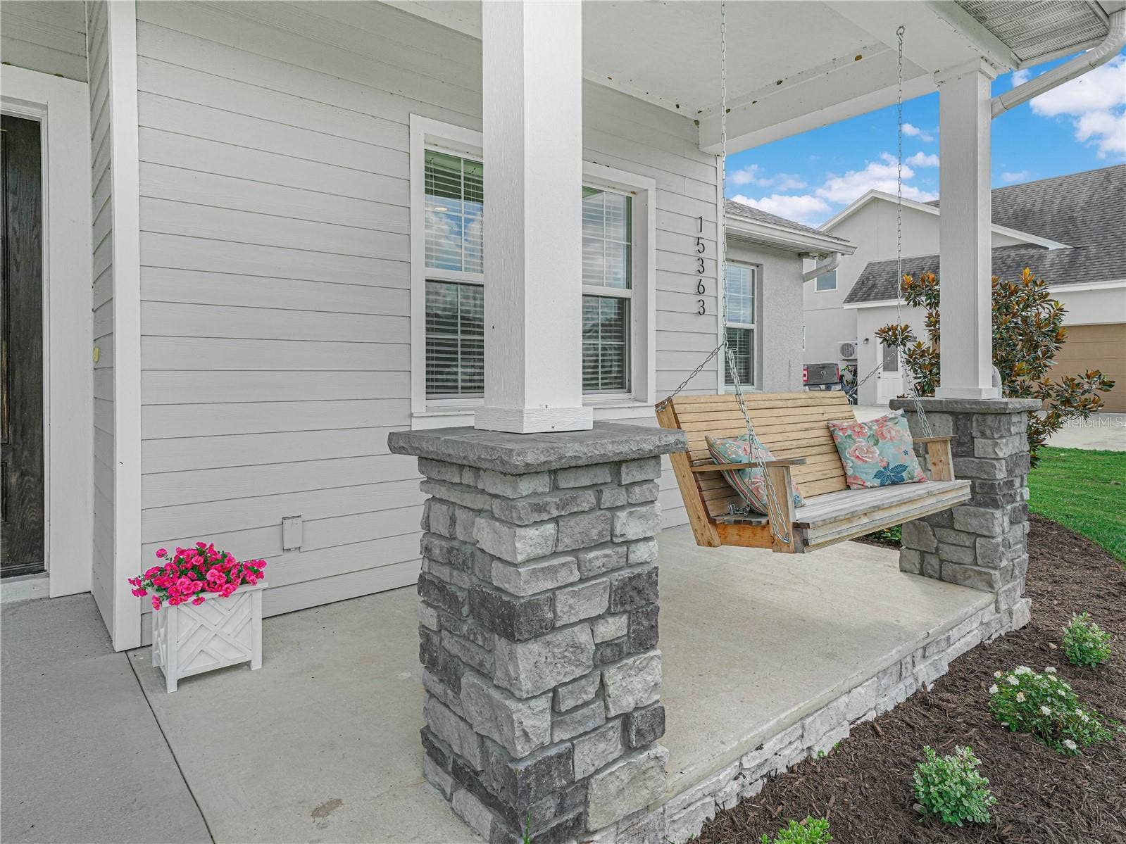 Charming Front Porch Swing
