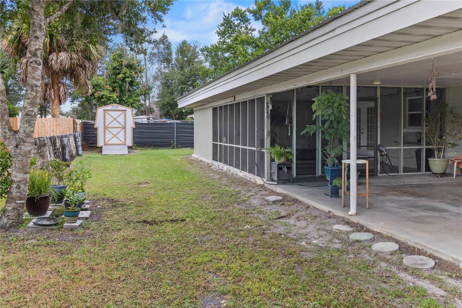 222 6TH STREET NE, Fort Meade, FL 33841 Side yard and shed