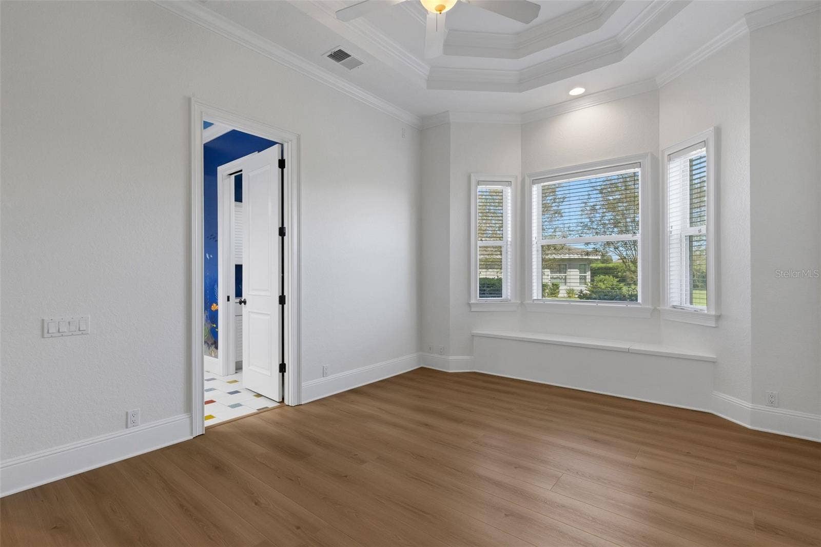 6562 EAGLE VIEW LOOP, Lakeland, FL 33813 Bedroom# 3 also has the window seat storage and a giant walk-in closet that wraps under the stairs.