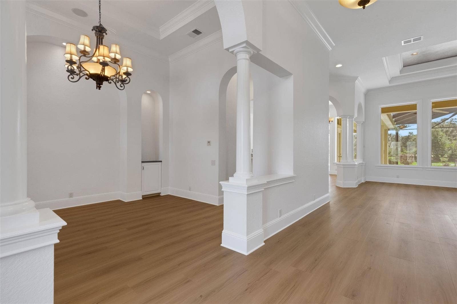 6562 EAGLE VIEW LOOP, Lakeland, FL 33813 New luxury vinyl plank flooring throughout the first floor and freshly painted from ceiling to baseboards.