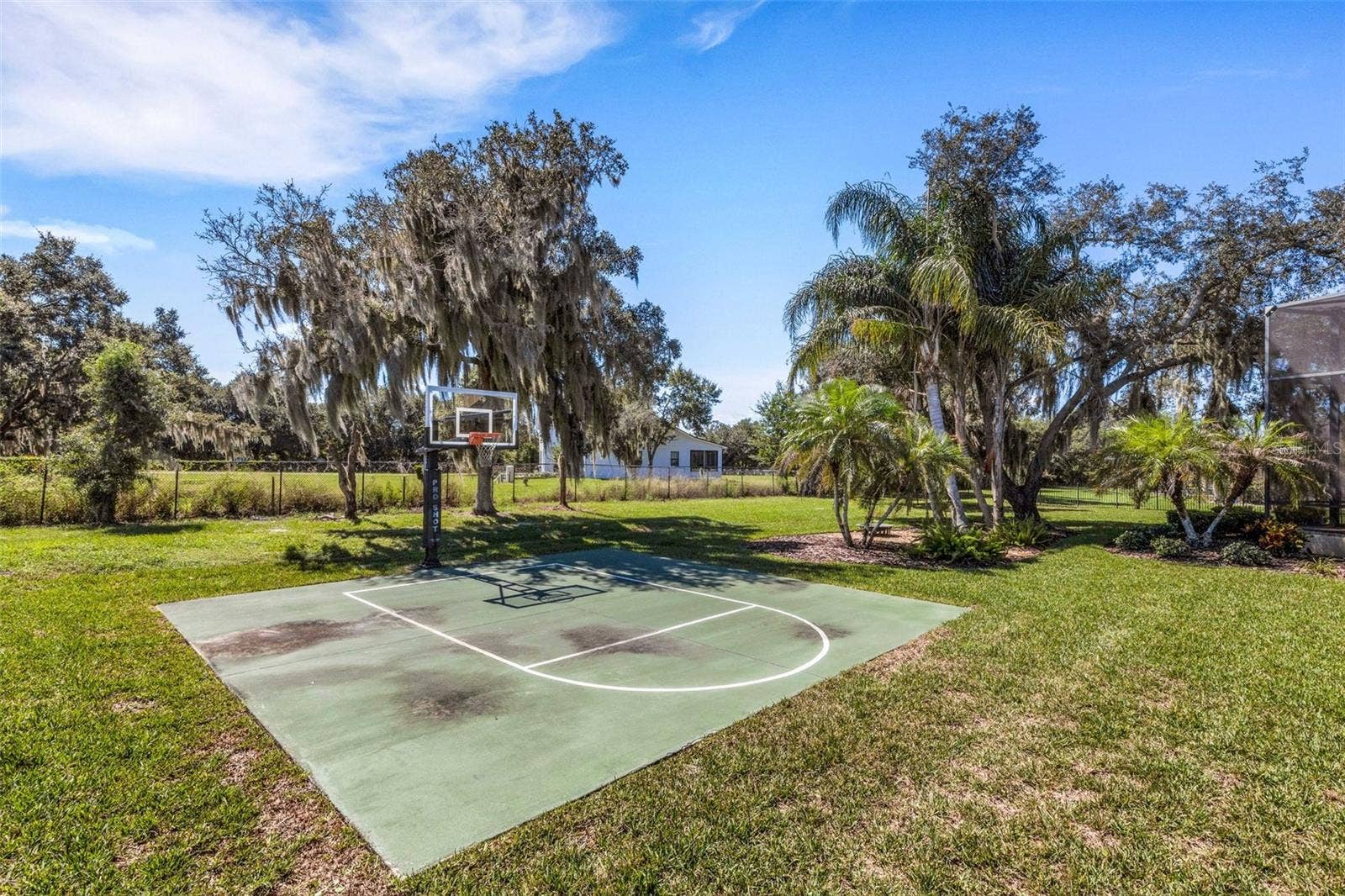 6562 EAGLE VIEW LOOP, Lakeland, FL 33813 There is even a private backyard basketball court . . . game on!!