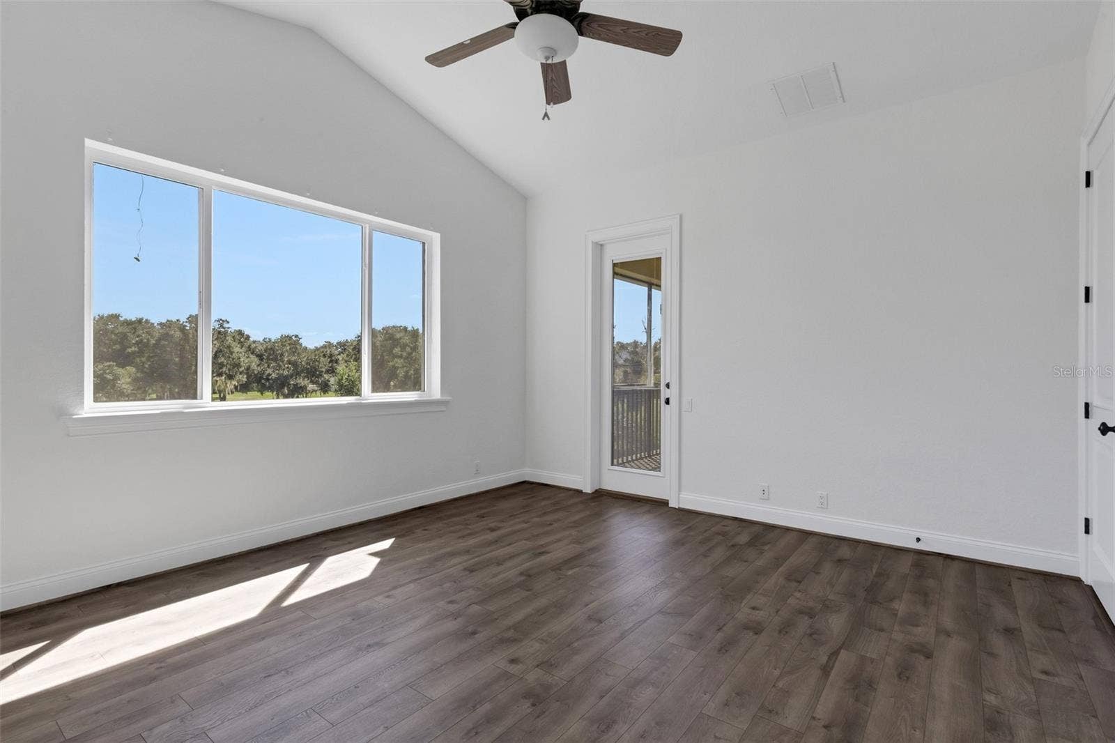 6562 EAGLE VIEW LOOP, Lakeland, FL 33813 and also has a door that leads to the balcony area.