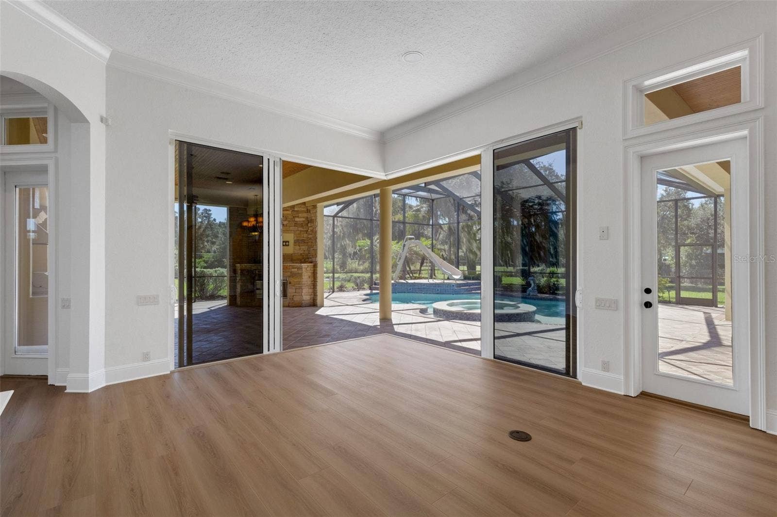 6562 EAGLE VIEW LOOP, Lakeland, FL 33813 The dual stacking sliders open completely at the corner to bring the outdoors inside at any time of the year.