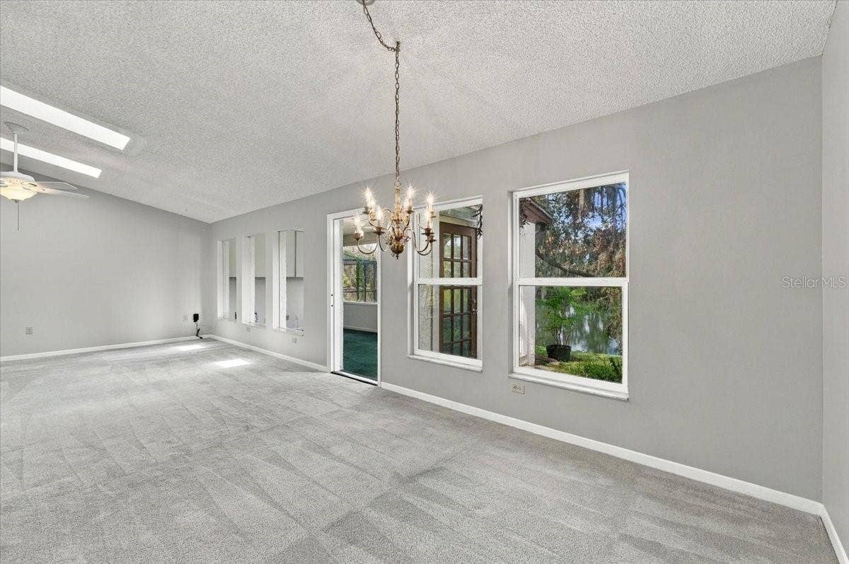 Dining area looking into living room