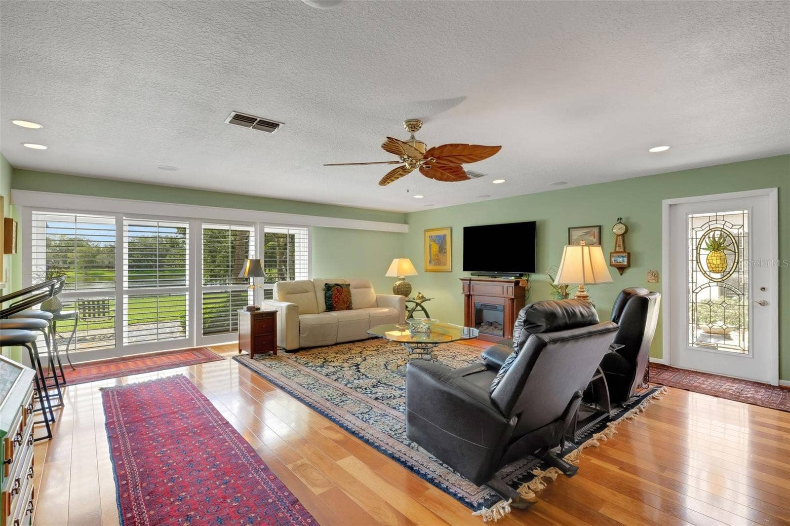 3507 BARLEY LANE, Lakeland, FL 33803 Next let's explore the 20' x 22' family room with sliders leading to the outside open flagstone patio . . .
