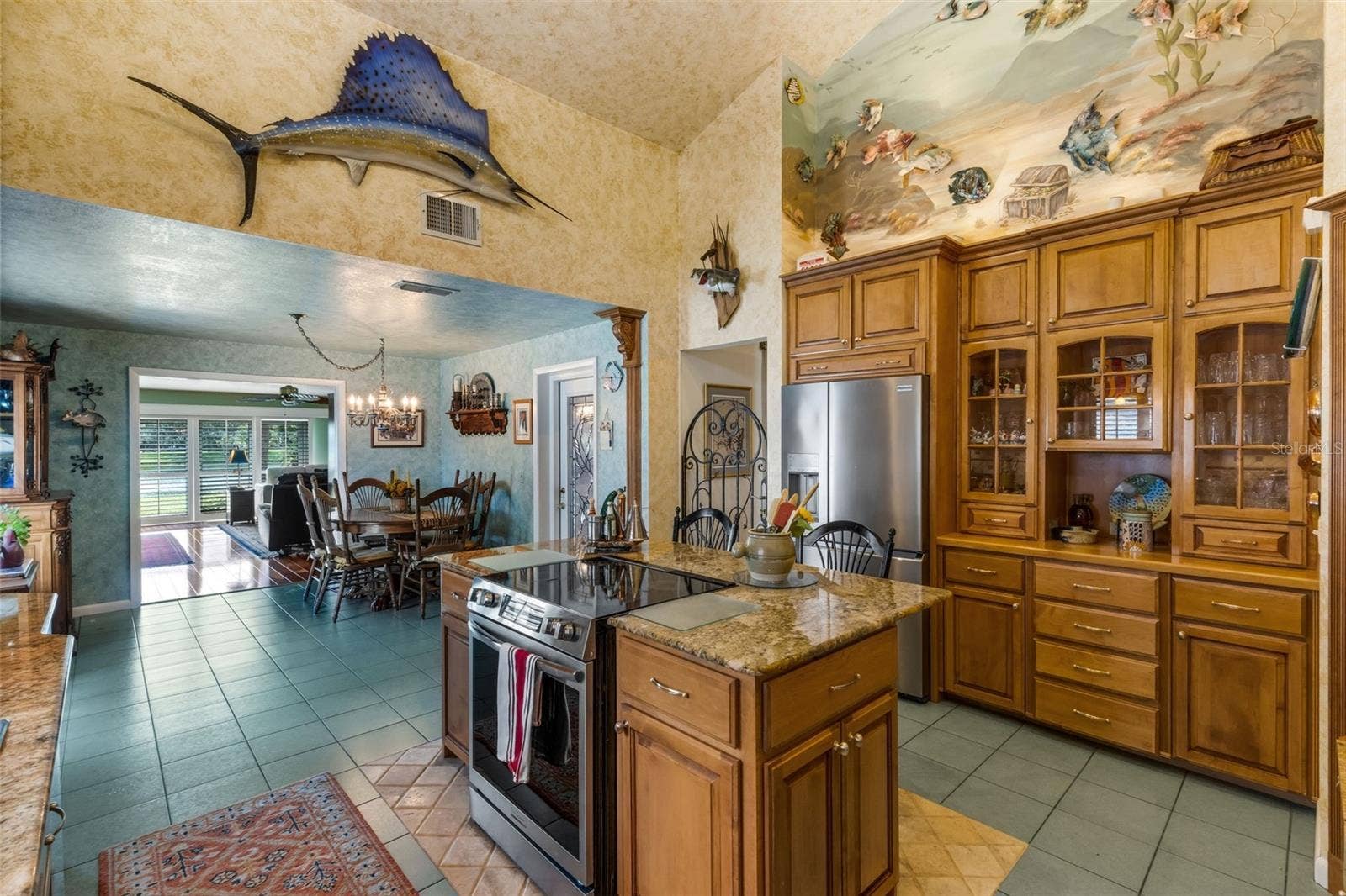 3507 BARLEY LANE, Lakeland, FL 33803 Stepping into the kitchen you will be amazed at the amount of storage afforded by the newer solid wood cabinets.