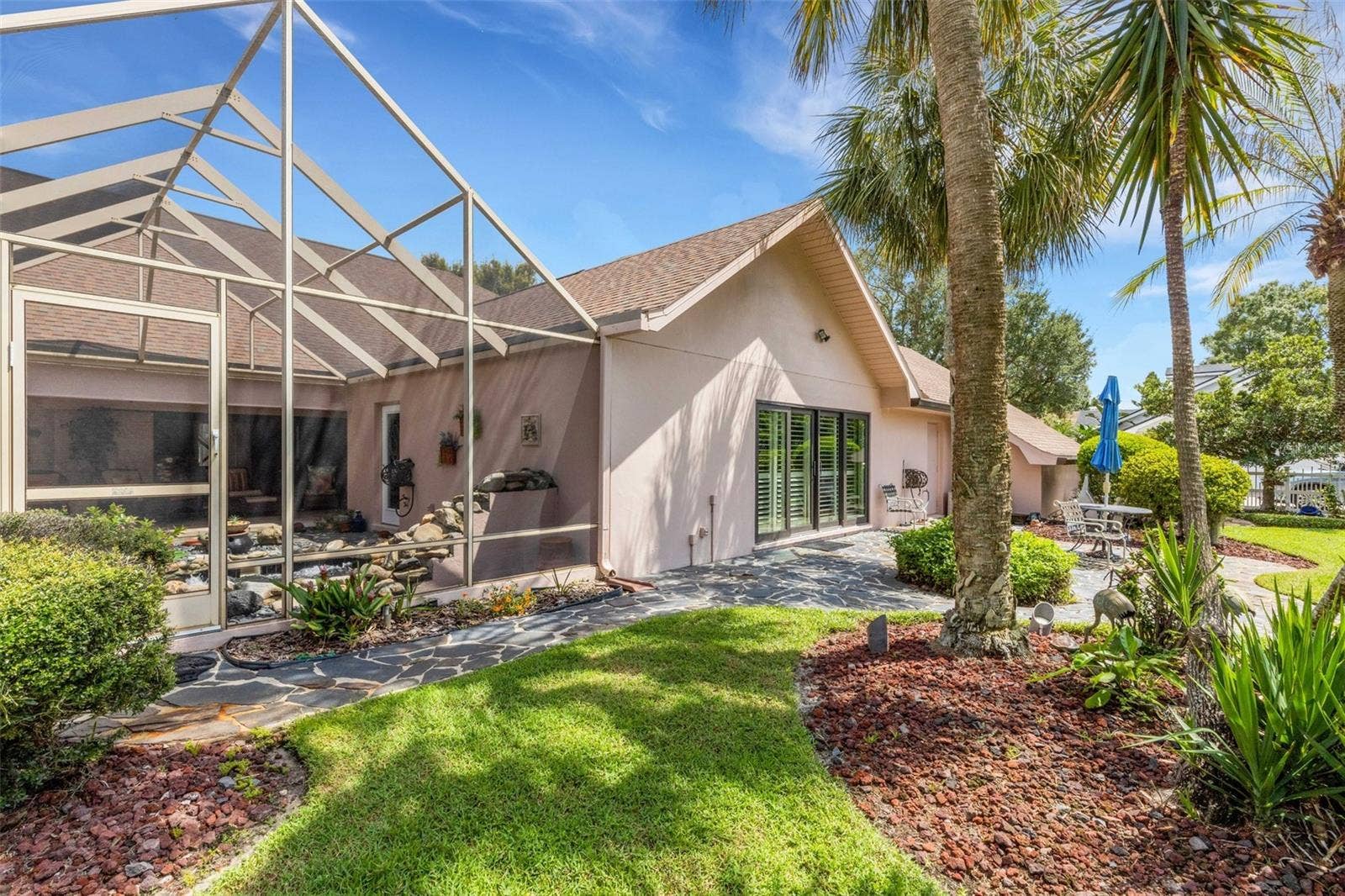 3507 BARLEY LANE, Lakeland, FL 33803 This space is also accessible from the family room through large sliding glass doors.