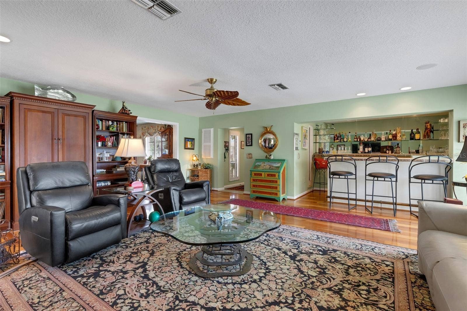 3507 BARLEY LANE, Lakeland, FL 33803 And beneath your feet is the same gleaming wood flooring.