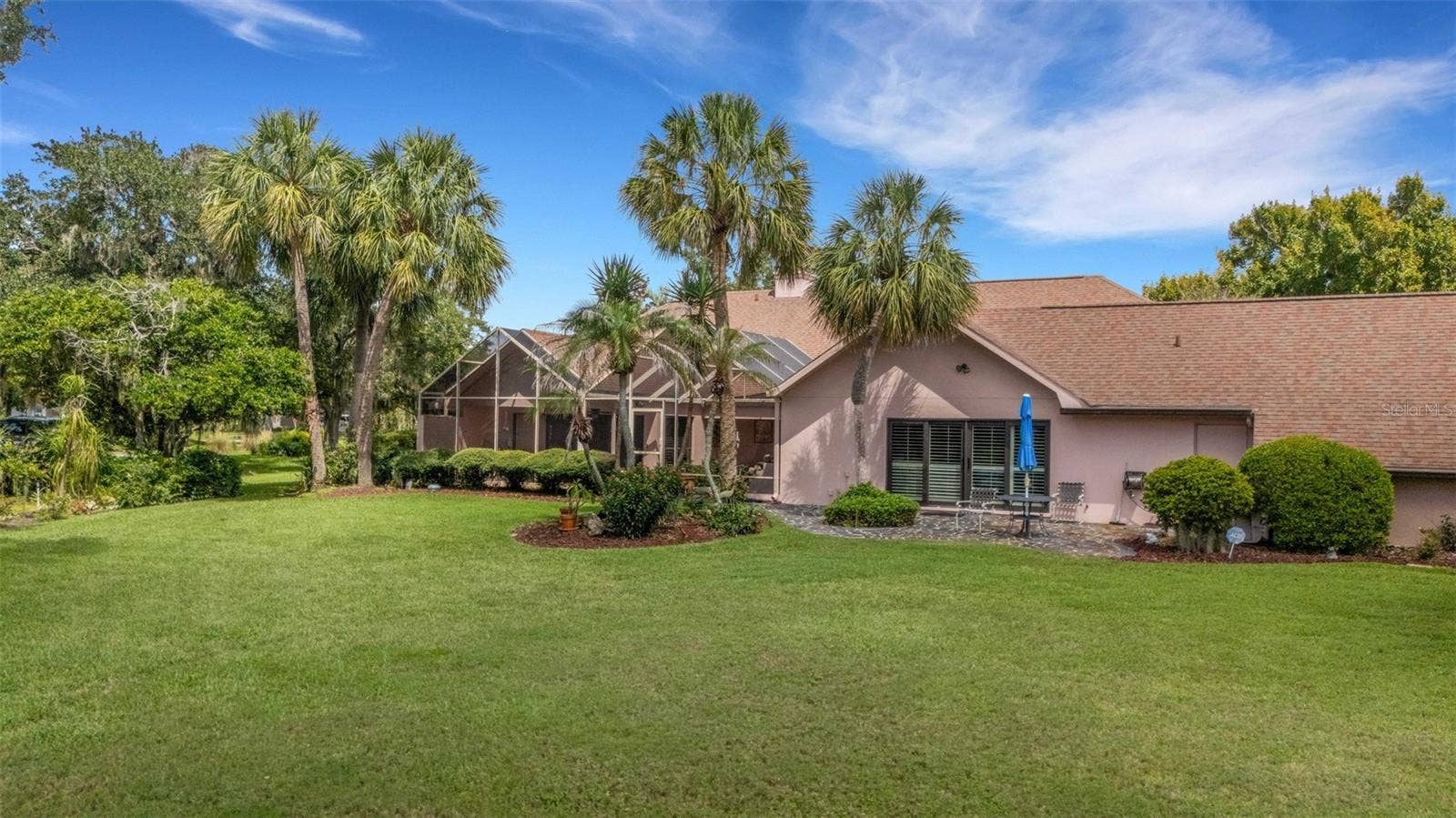 3507 BARLEY LANE, Lakeland, FL 33803 Large trees provide shade without hampering the view.