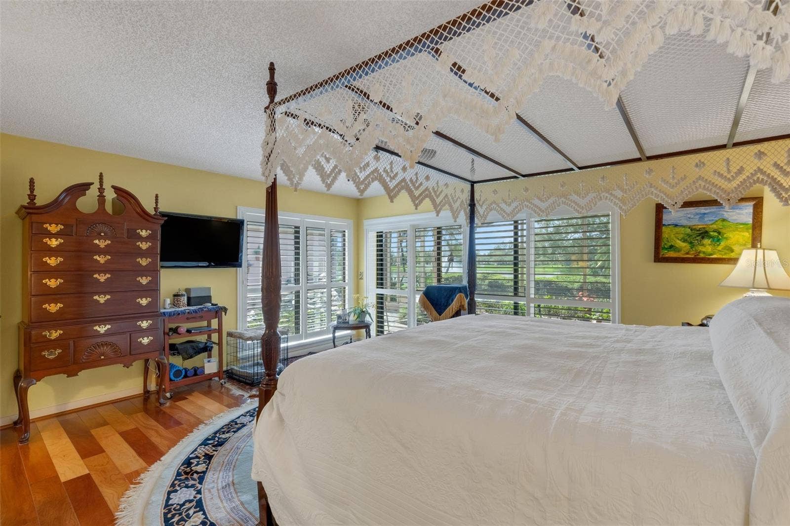 3507 BARLEY LANE, Lakeland, FL 33803 with two walls of windows to afford the occupant peaceful views of the rear courtyard, backyard and water beyond.