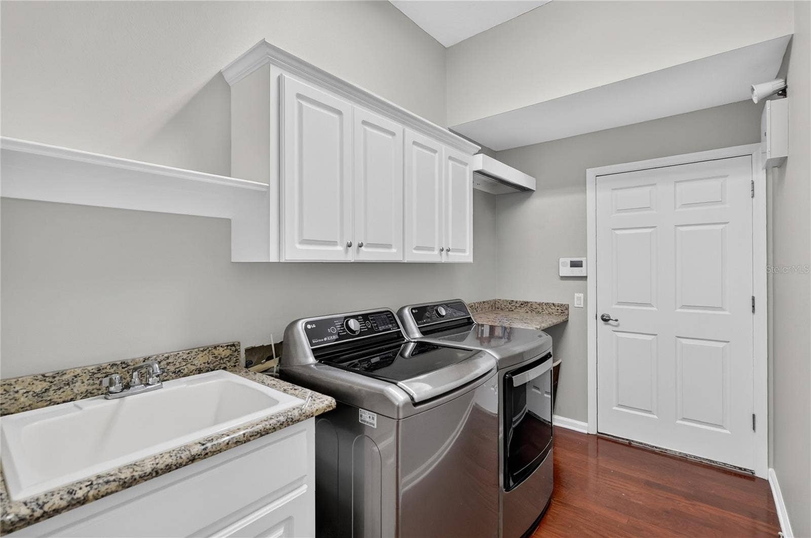 Laundry Room Includes Washer and Dryer