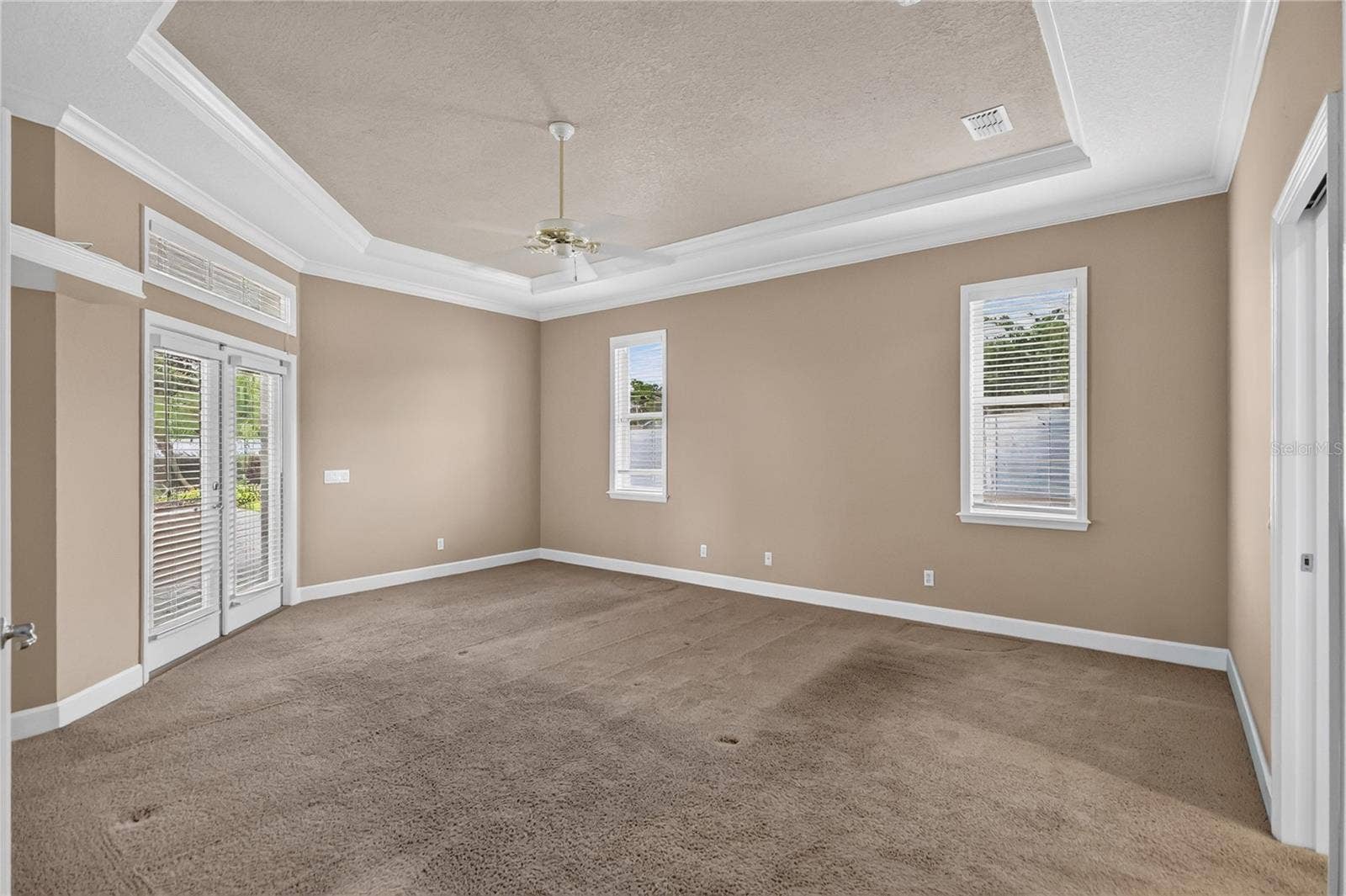 Master Bedroom with French Doors out to Lania