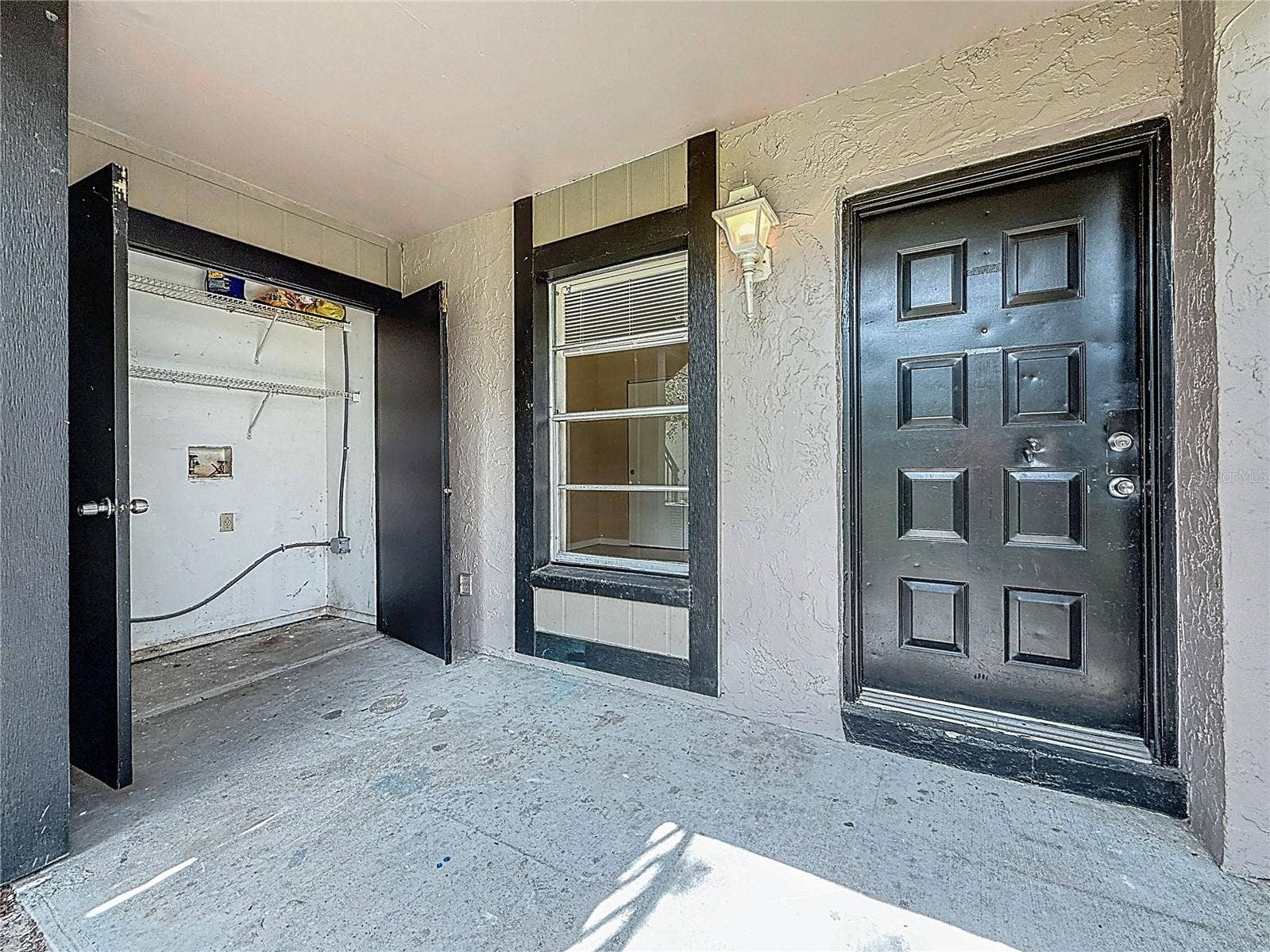 4022 TUMBLE WOOD TRAIL, #101, Tampa, FL 33613 Entry with Laundry closet