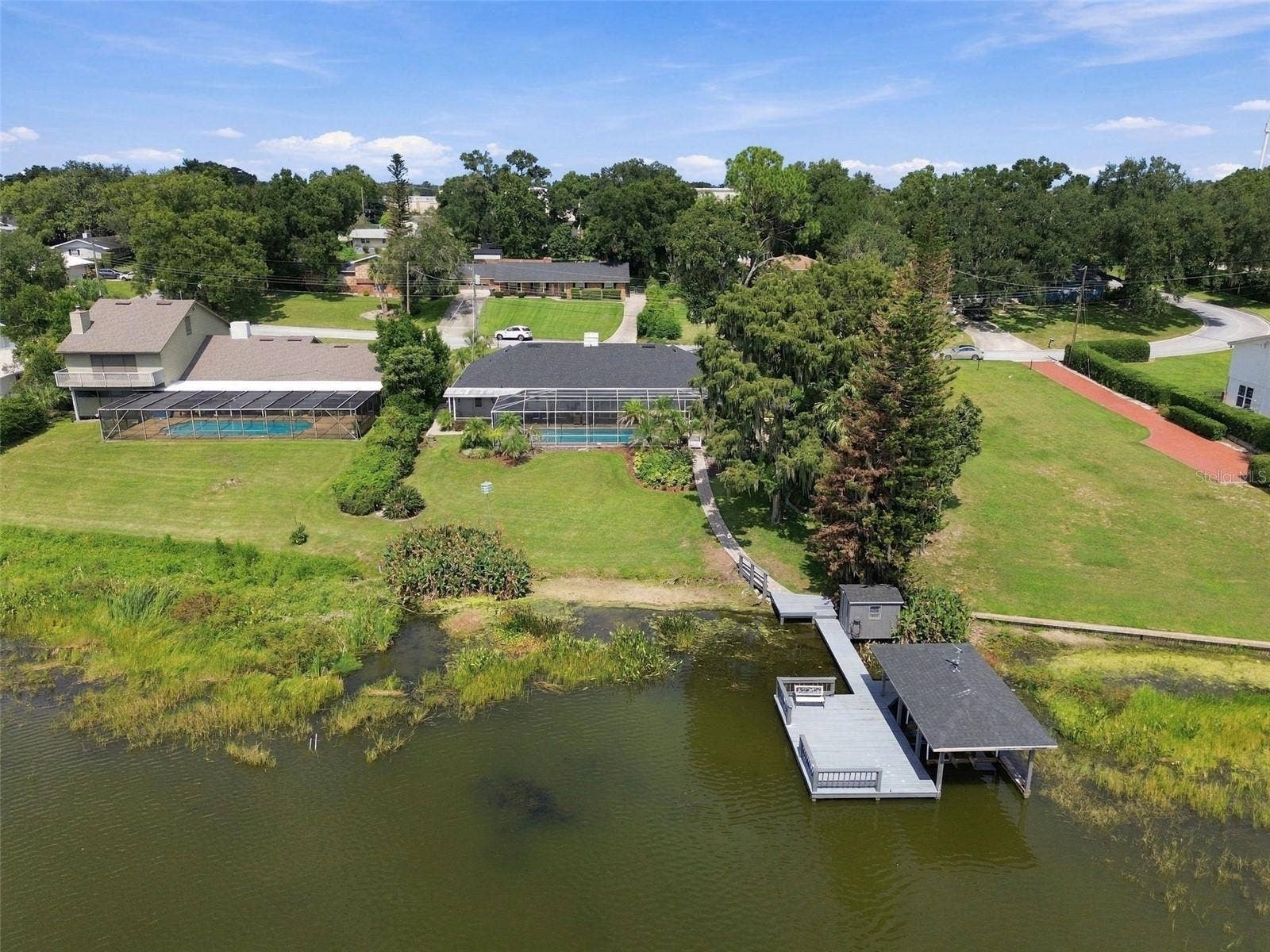 1921 MANOR CIRCLE SE, Winter Haven, FL 33880 Dock & boathouse with lift