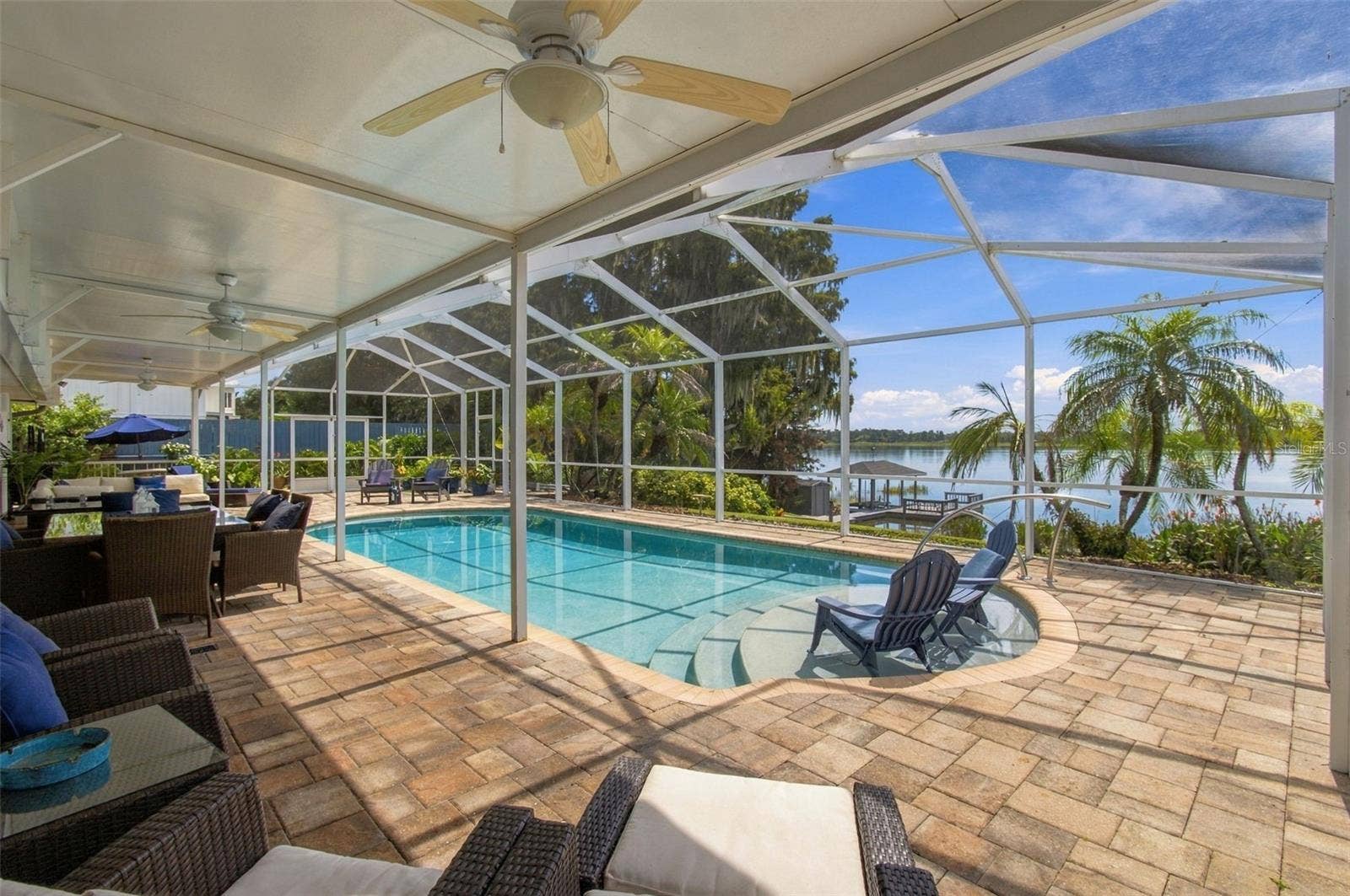1921 MANOR CIRCLE SE, Winter Haven, FL 33880 Covered lanai / Screen enclosed pool