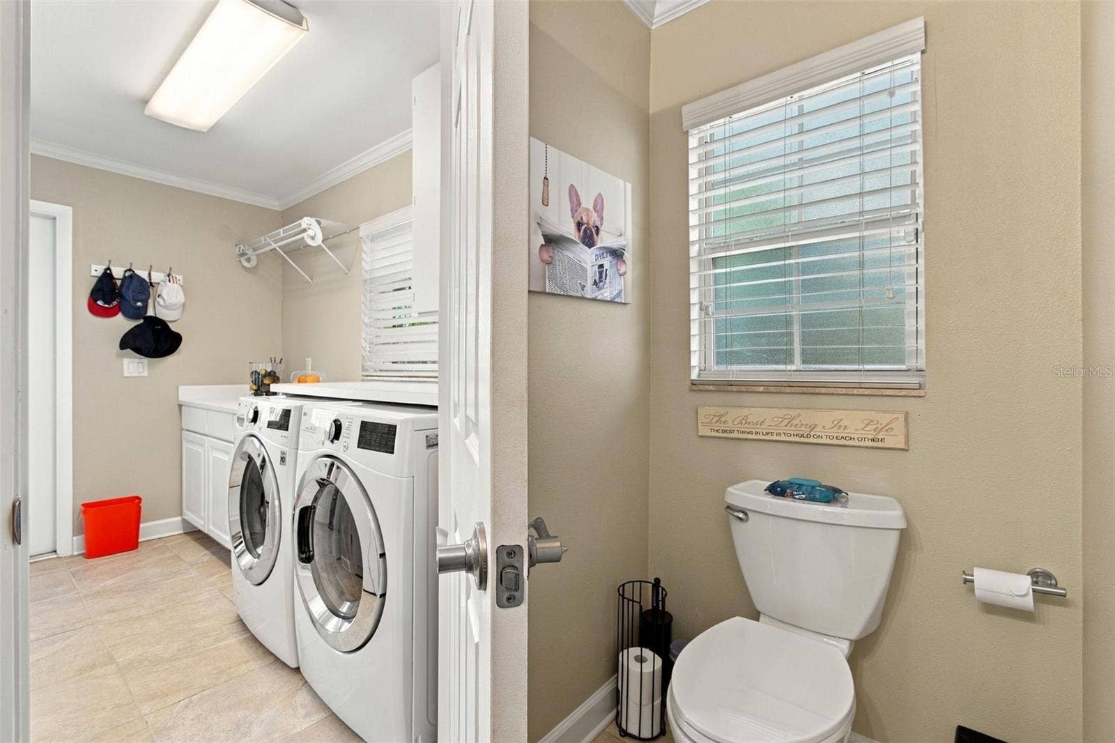 1921 MANOR CIRCLE SE, Winter Haven, FL 33880 Laundry room & half bathroom