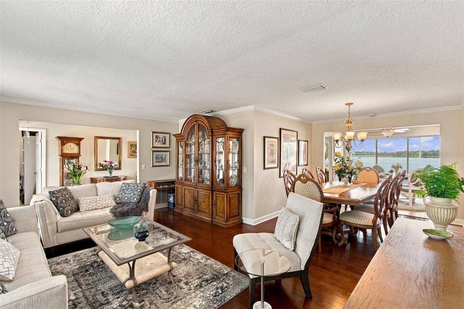 1921 MANOR CIRCLE SE, Winter Haven, FL 33880 Formal living room & dining room - Hardwood flooring