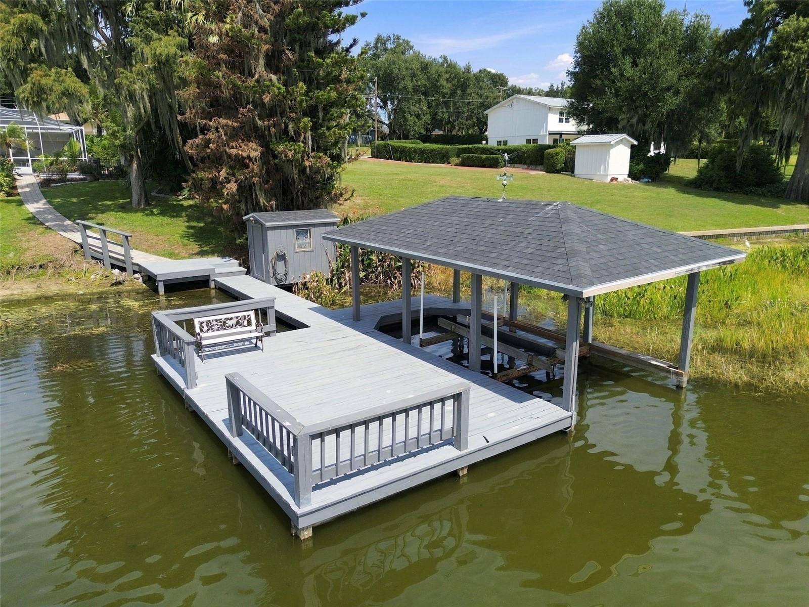 1921 MANOR CIRCLE SE, Winter Haven, FL 33880 Dock & boathouse with lift