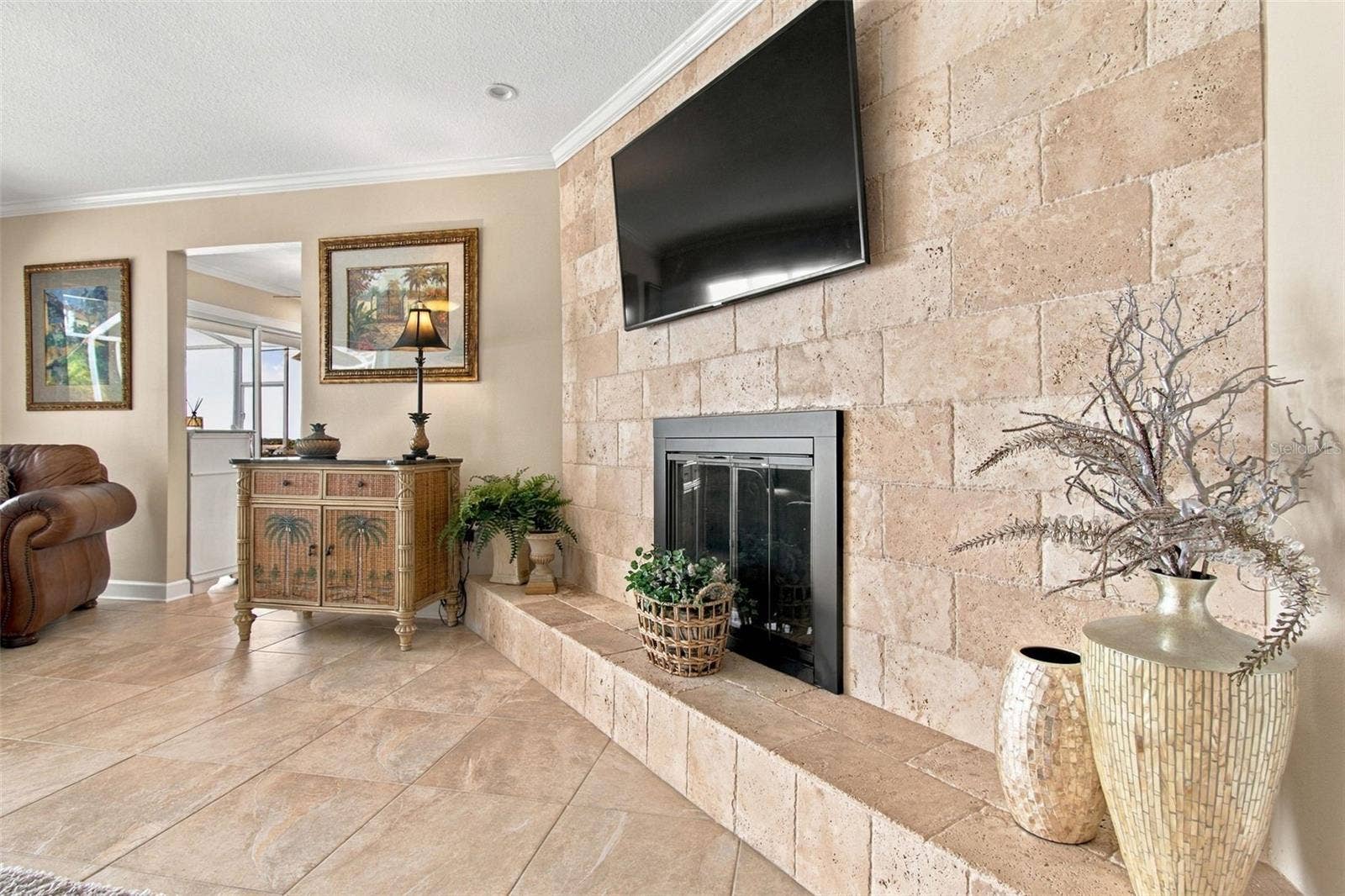 1921 MANOR CIRCLE SE, Winter Haven, FL 33880 Family room - wood burning fireplace