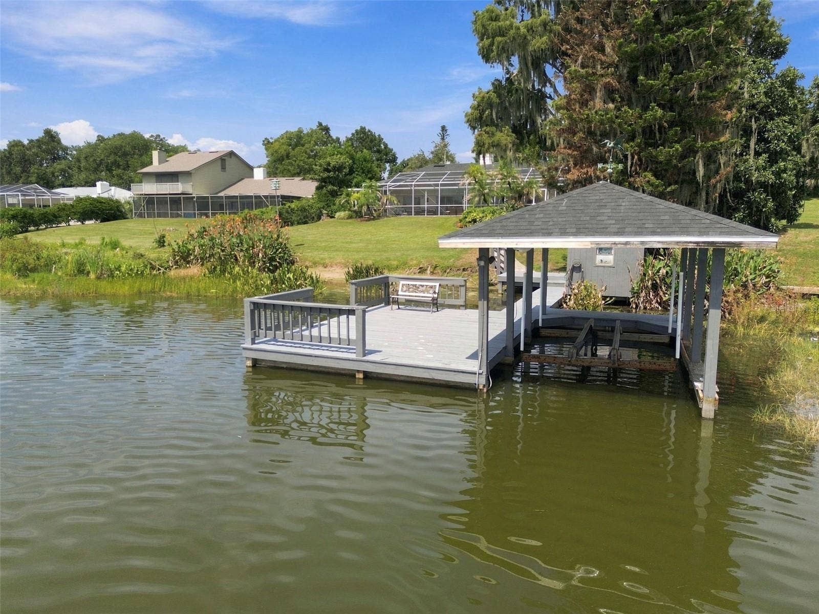 1921 MANOR CIRCLE SE, Winter Haven, FL 33880 Dock & boathouse with lift