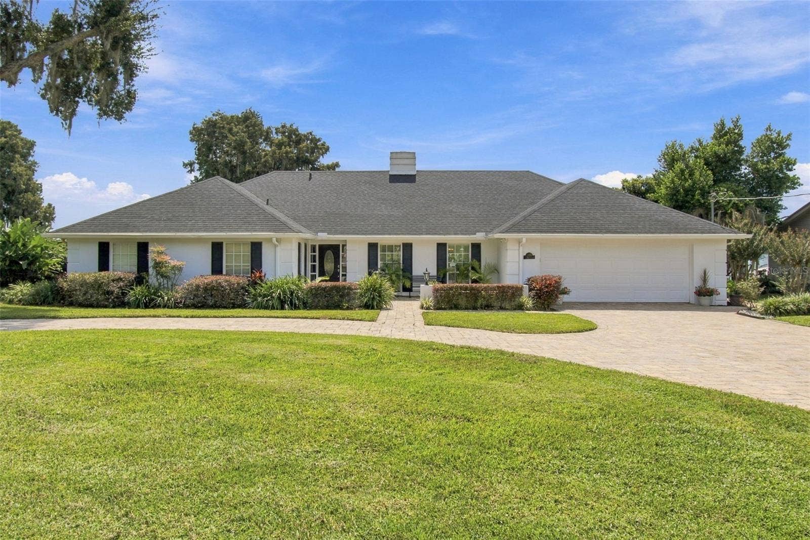 1921 MANOR CIRCLE SE, Winter Haven, FL 33880 Front exterior - new roof