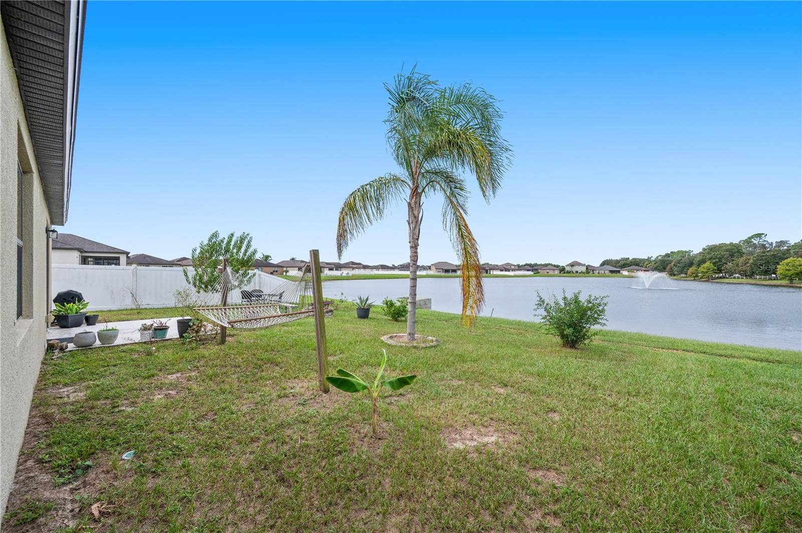 8751 RINDGE ROAD, Polk City, FL 33868 Backyard Pond View