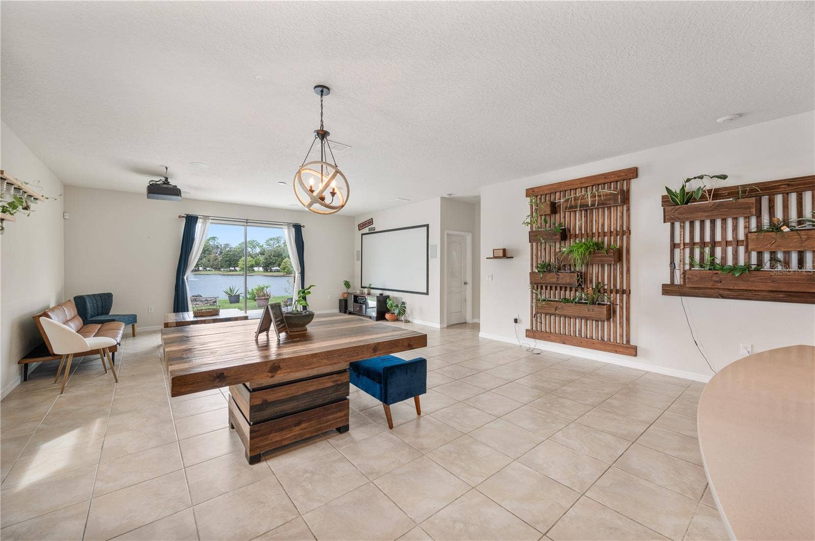 8751 RINDGE ROAD, Polk City, FL 33868 Open Floor Plan / Kitchen / Dining Room / Living Room
