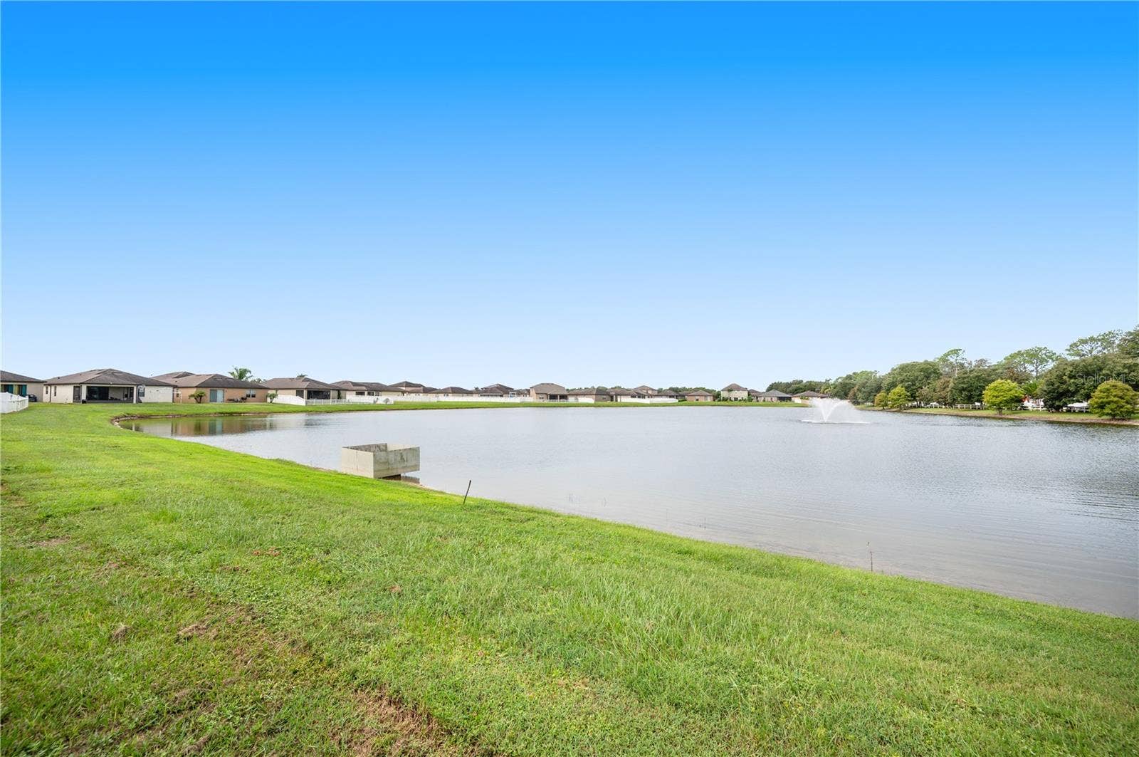 8751 RINDGE ROAD, Polk City, FL 33868 Backyard Pond View