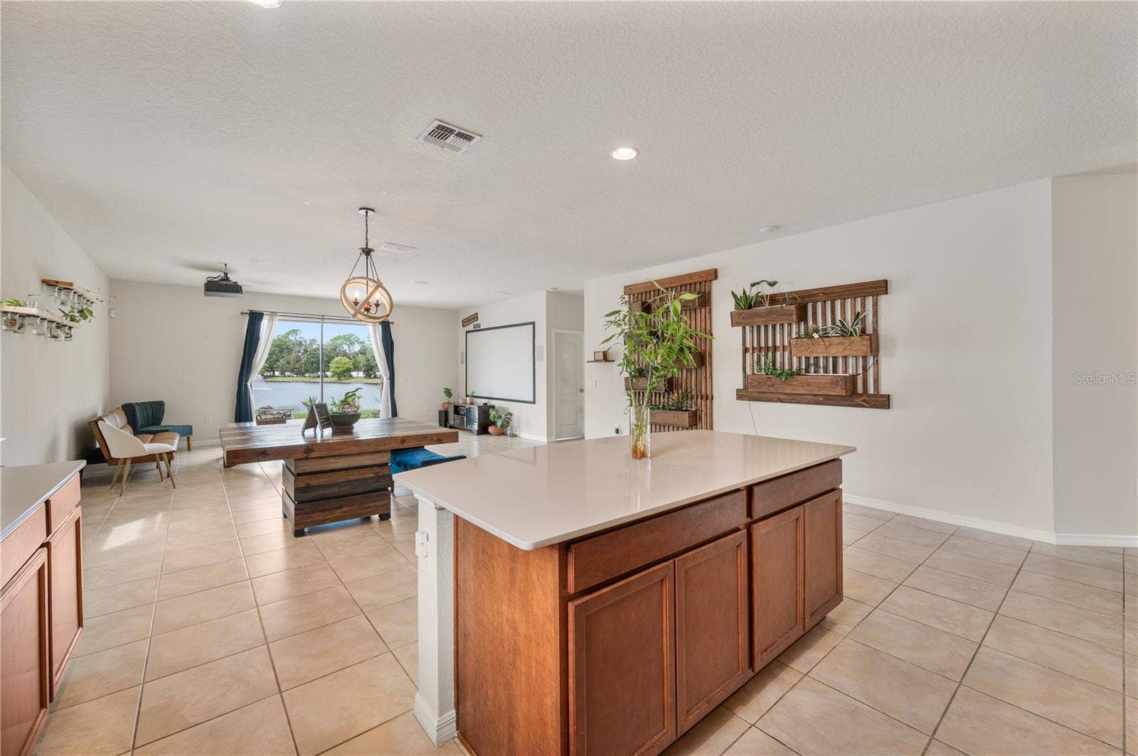 8751 RINDGE ROAD, Polk City, FL 33868 Open Floor Plan / Kitchen / Dining Room / Living Room