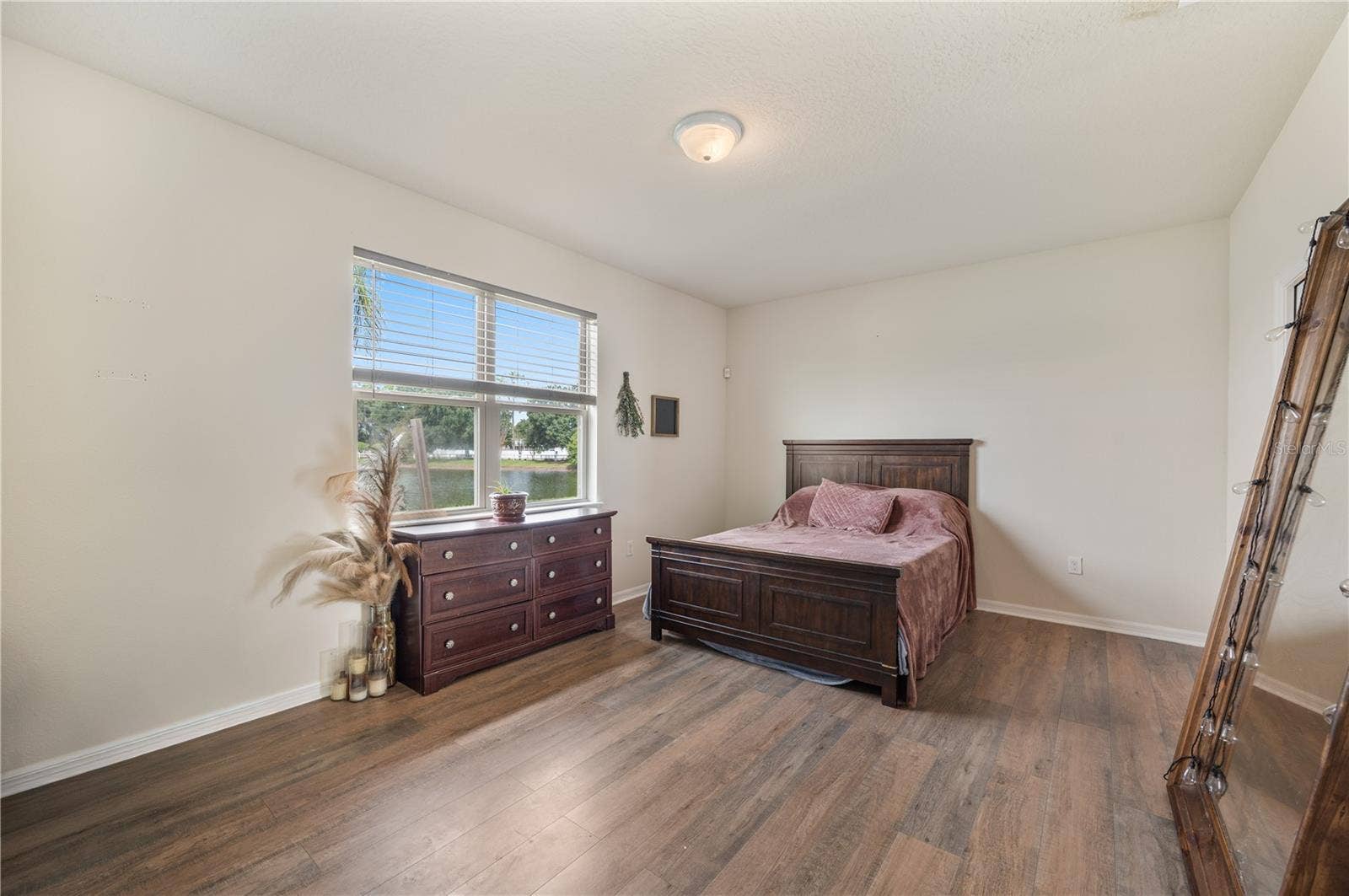 8751 RINDGE ROAD, Polk City, FL 33868 Primary Bedroom with Pond Views