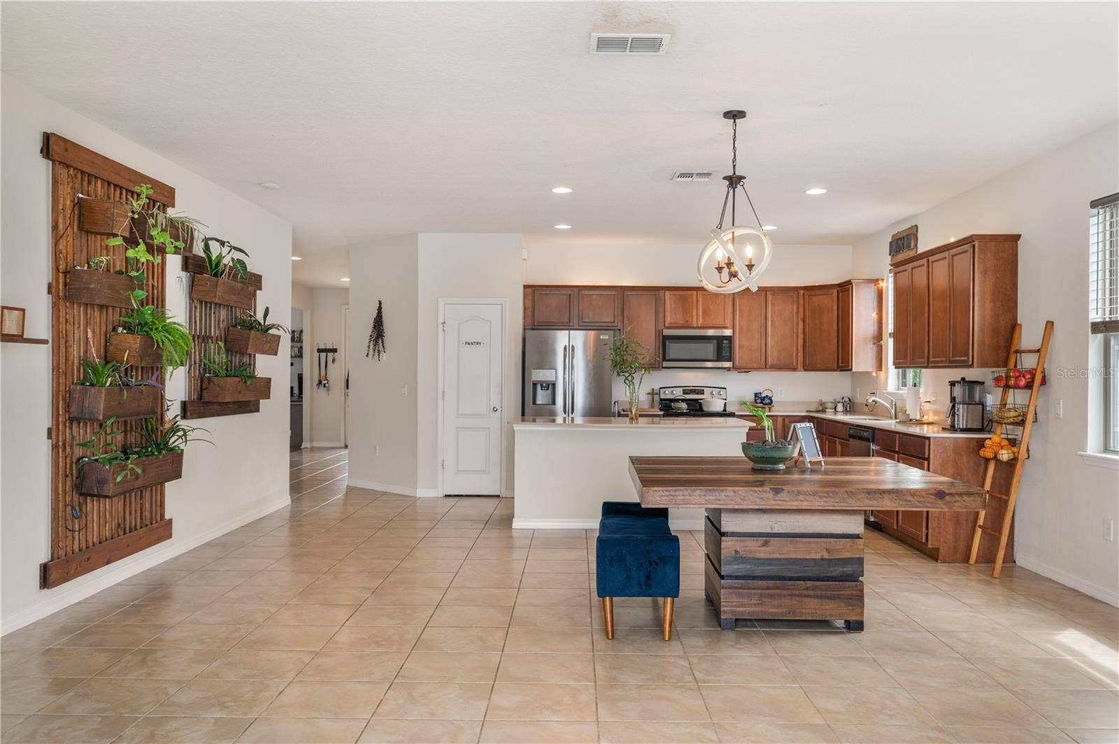 8751 RINDGE ROAD, Polk City, FL 33868 Open Floor Plan / Kitchen / Dining Room / Living Room