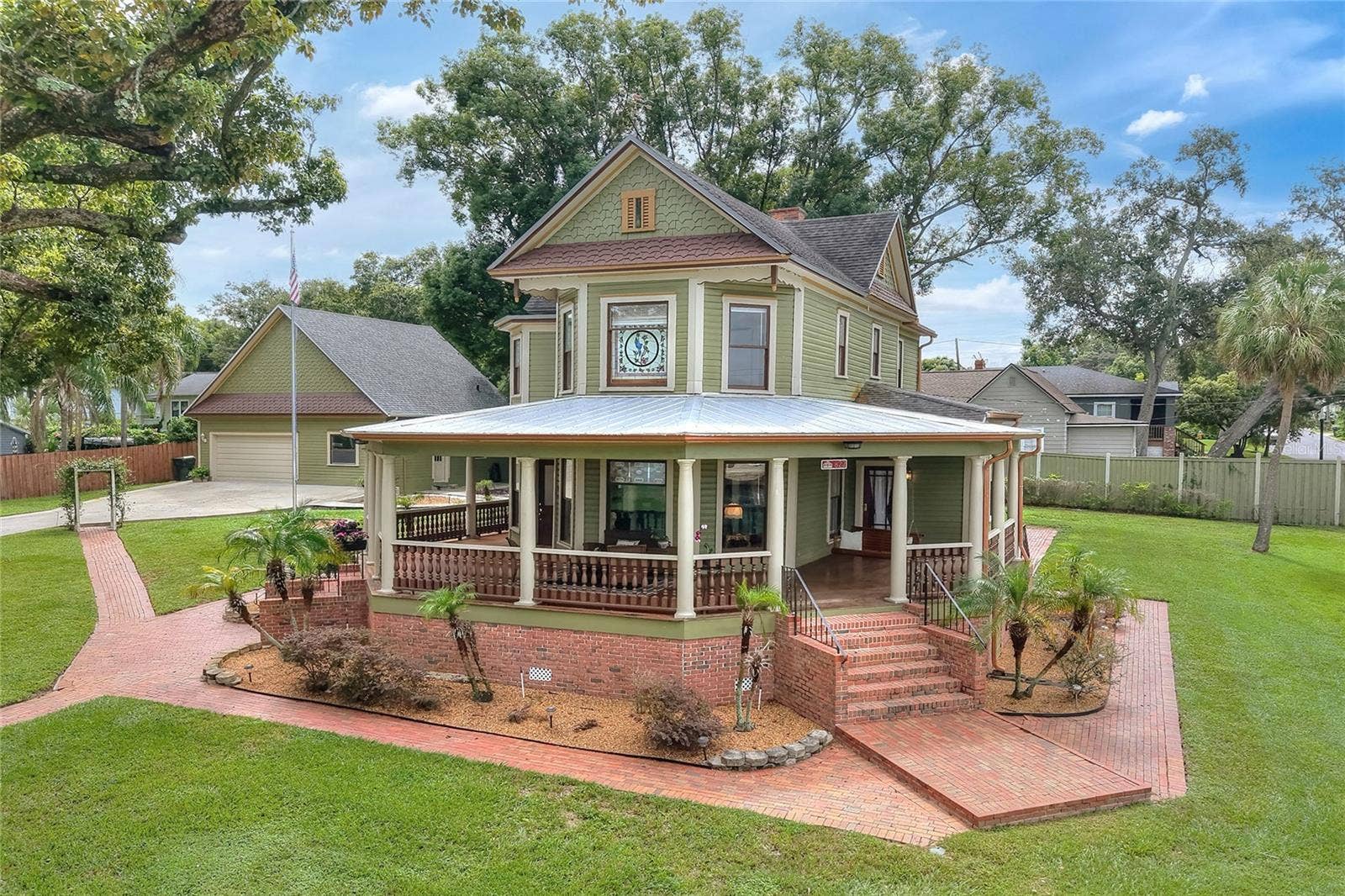 822 W PATTERSON STREET, Lakeland, FL 33803 Drone view of home and detached garage