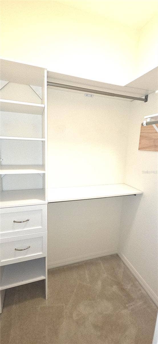 Primary Bedroom Walk-in Closet 1