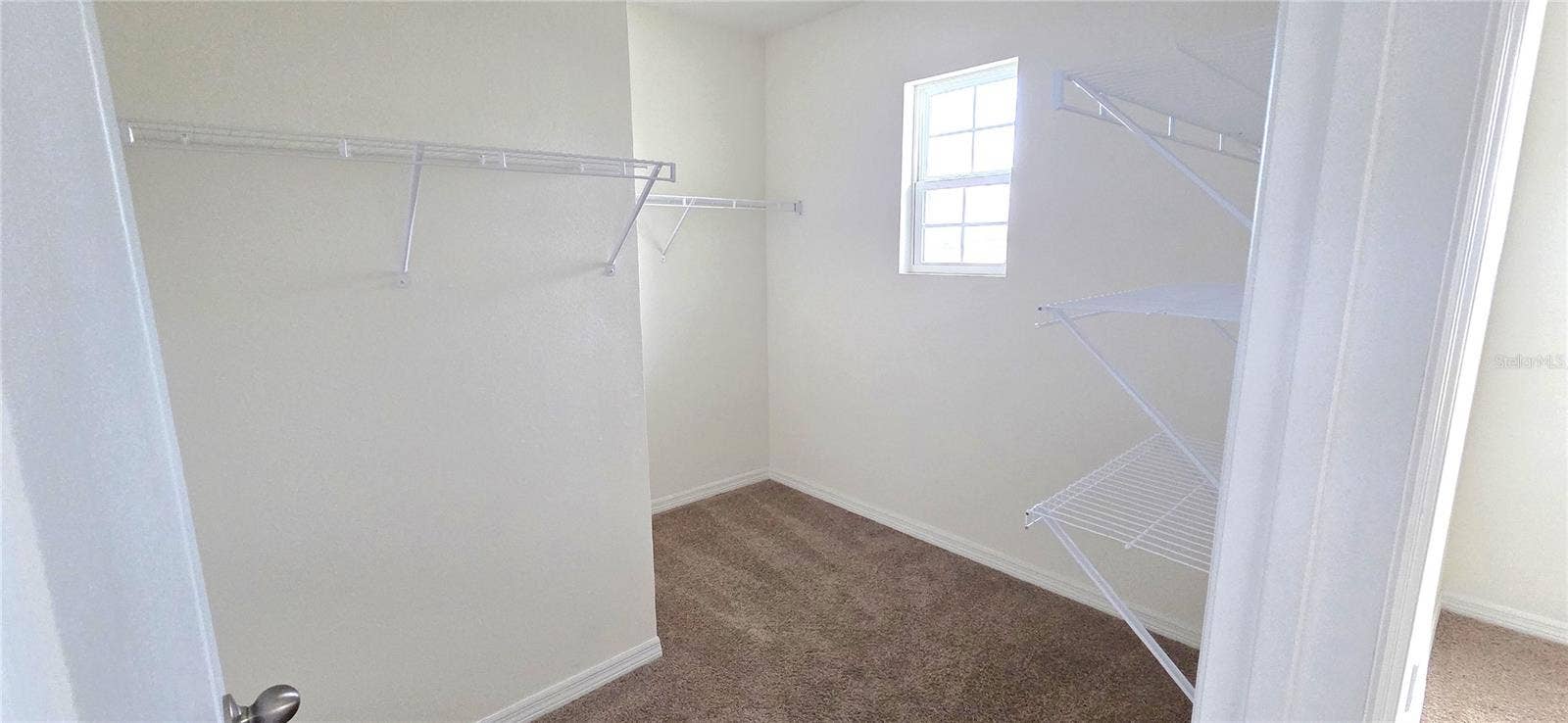 Primary Bedroom Walk-in Closet