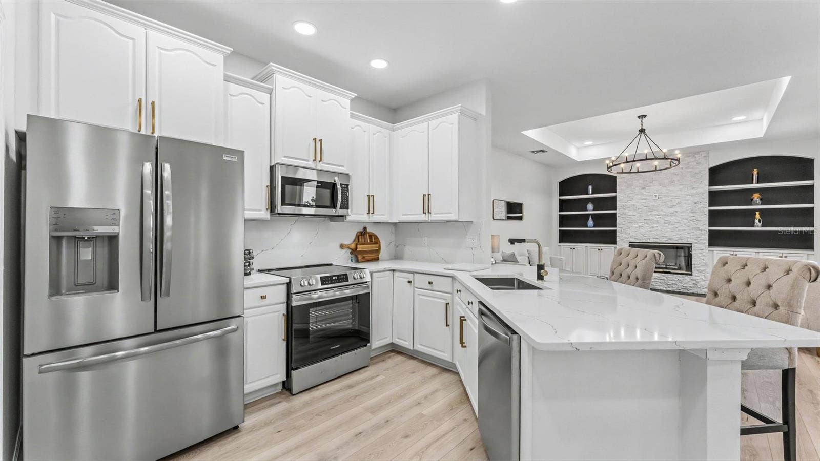 Gorgeous Kitchen with Quartz Counter tops  and backsplash and New Stainless Steel Appliances