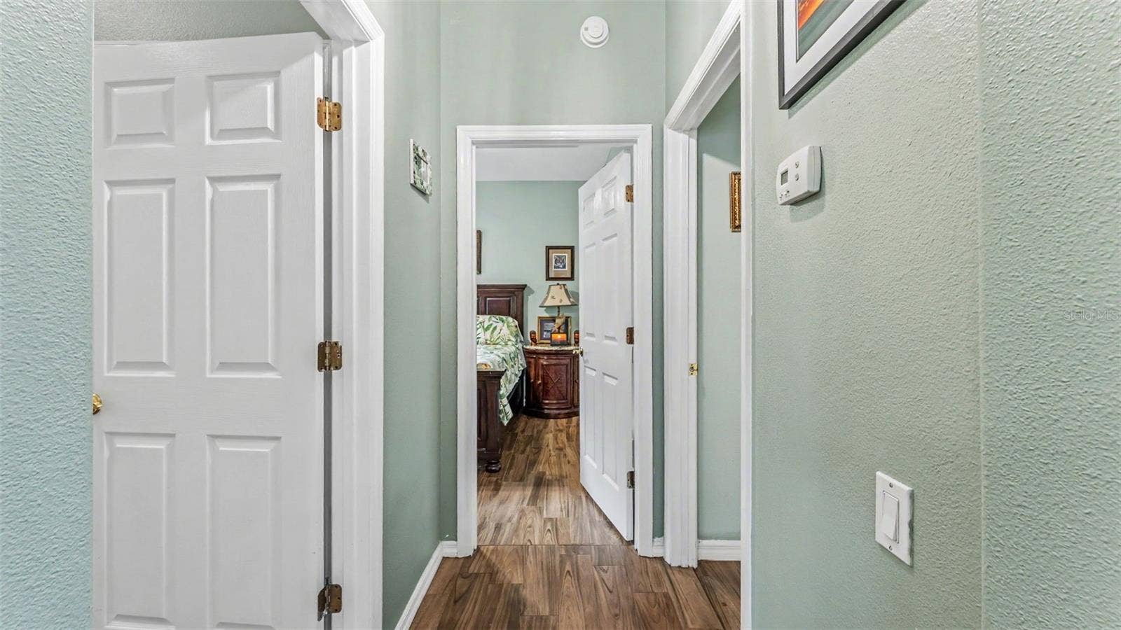 6626 ROYAL FOREST DR, Lakeland, FL 33811 hallway to 3rd and 4th bedrooms